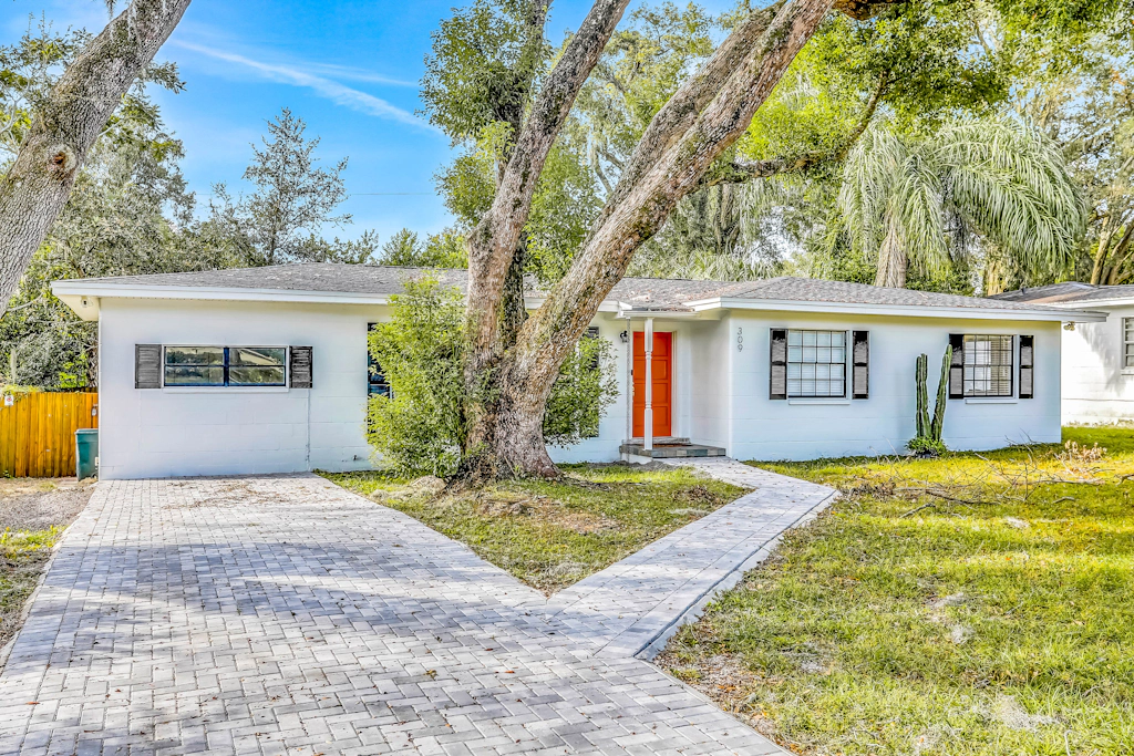 Single level home with pool fenced yard and screened porch a neighborhood park