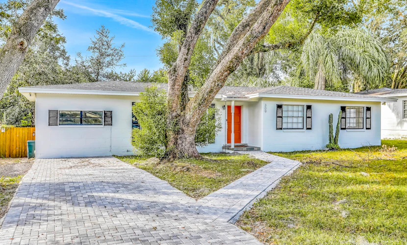 Single level home with pool fenced yard and screened porch a neighborhood park