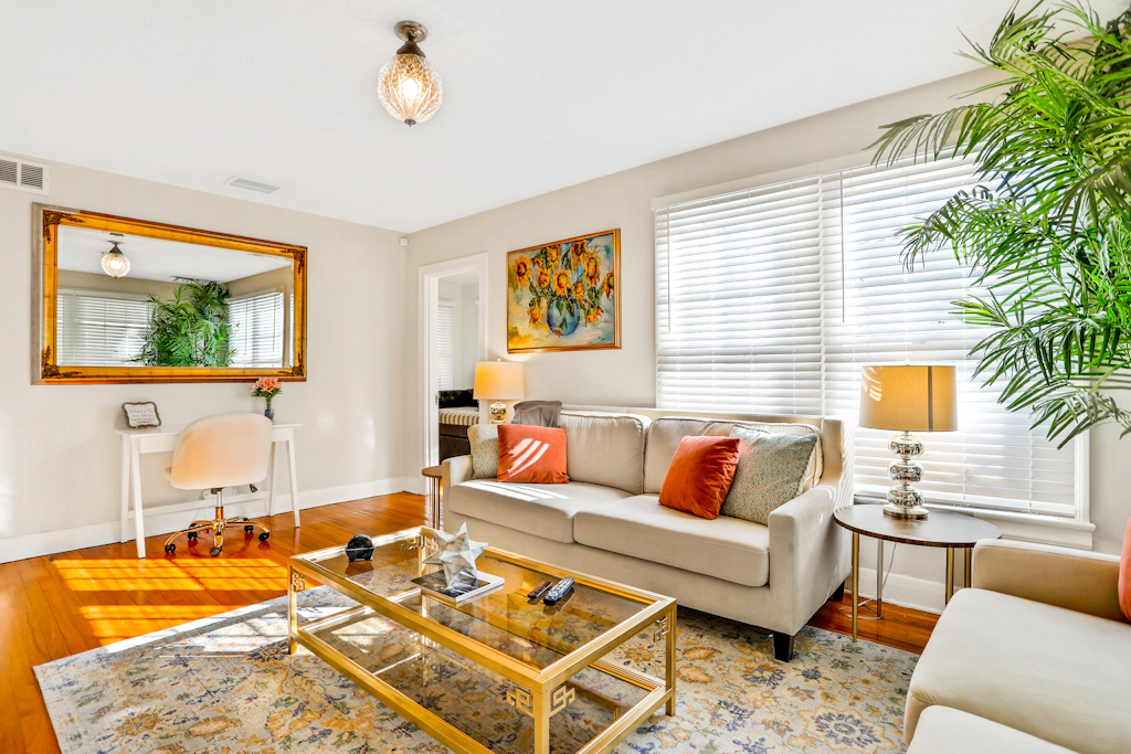 Sunny dog friendly central cottage with fenced yard and updated interior