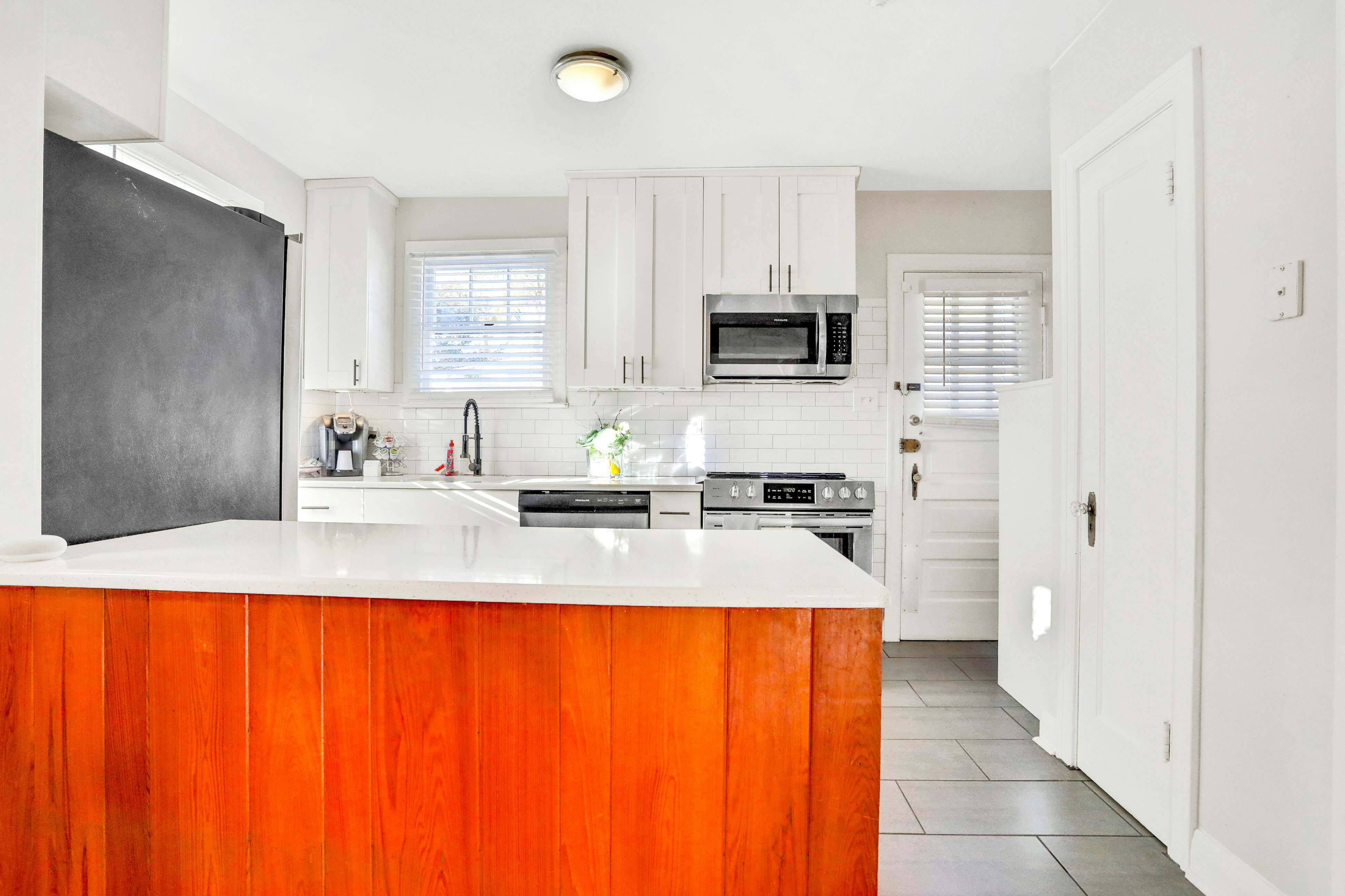 Sunny, dog-friendly central cottage with fenced yard & updated interior