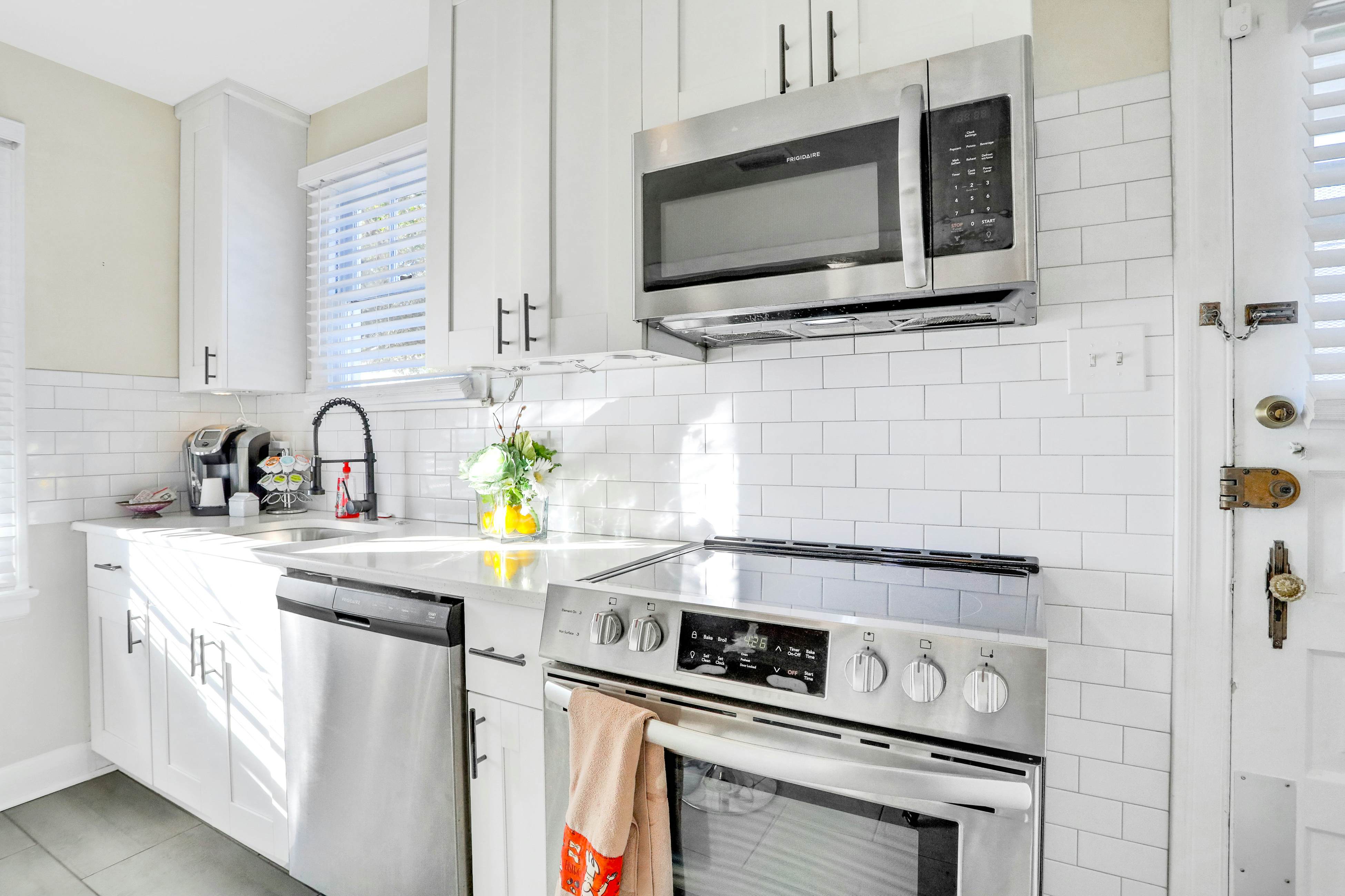 Sunny, dog-friendly central cottage with fenced yard & updated interior