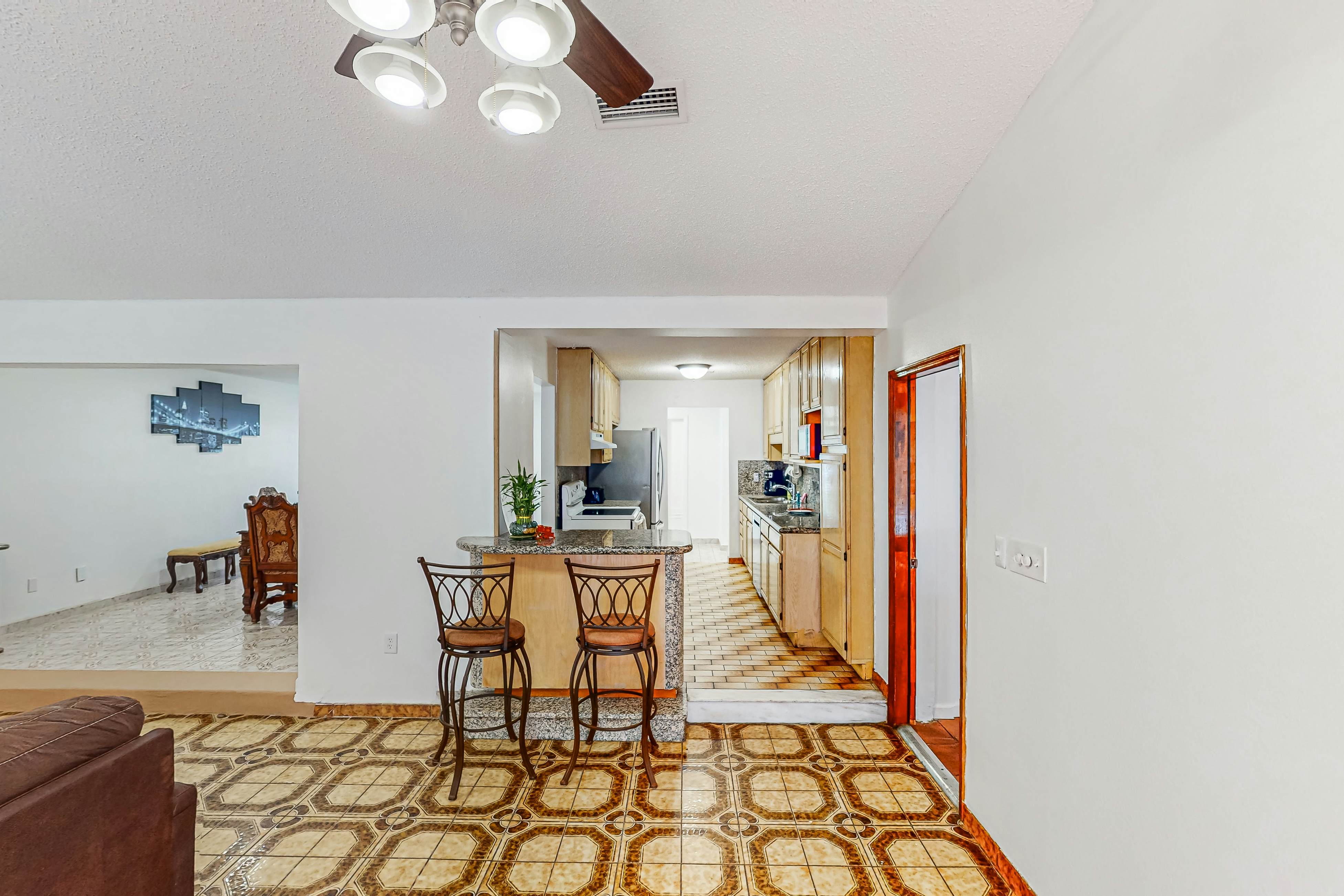 Conveniently located home with private pool, patio, foosball, & private W/D