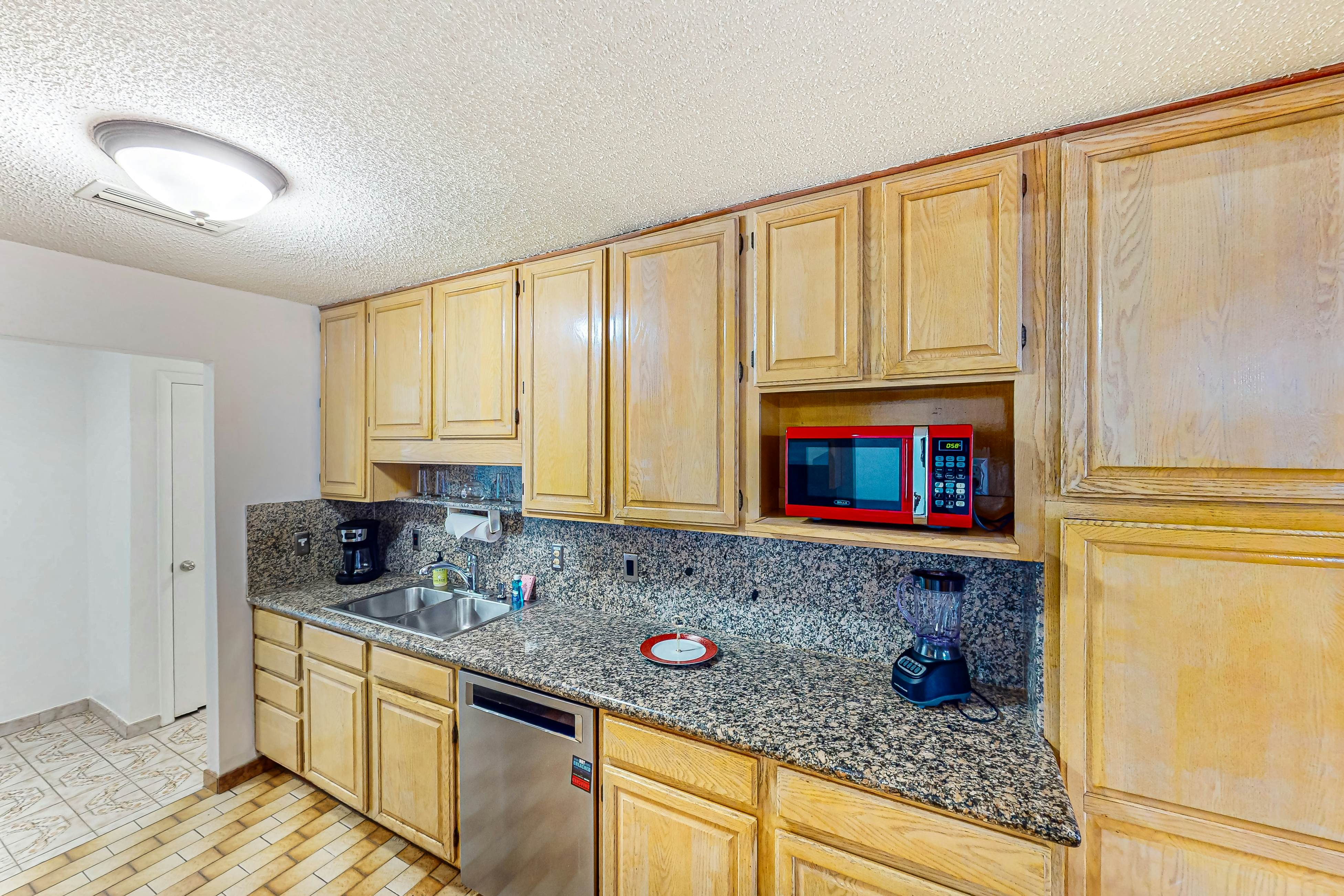 Conveniently located home with private pool, patio, foosball, & private W/D