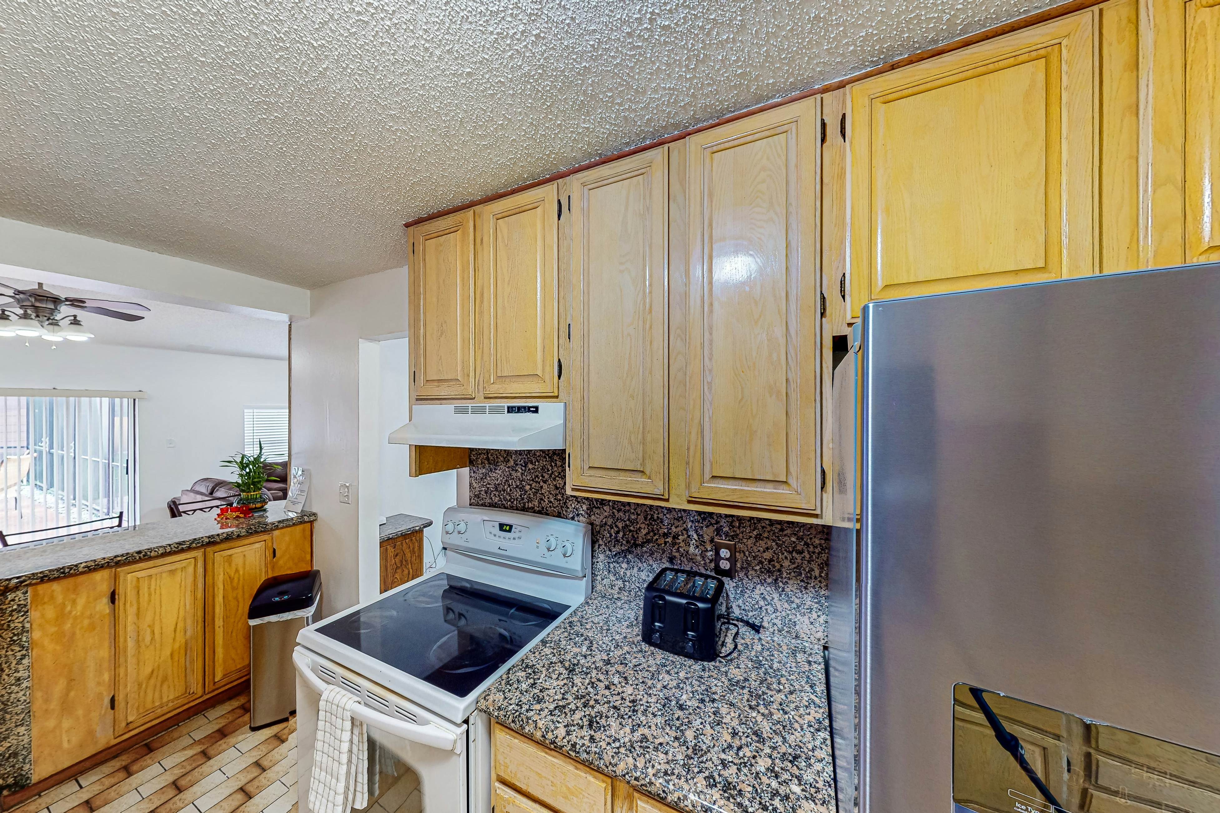 Conveniently located home with private pool, patio, foosball, & private W/D