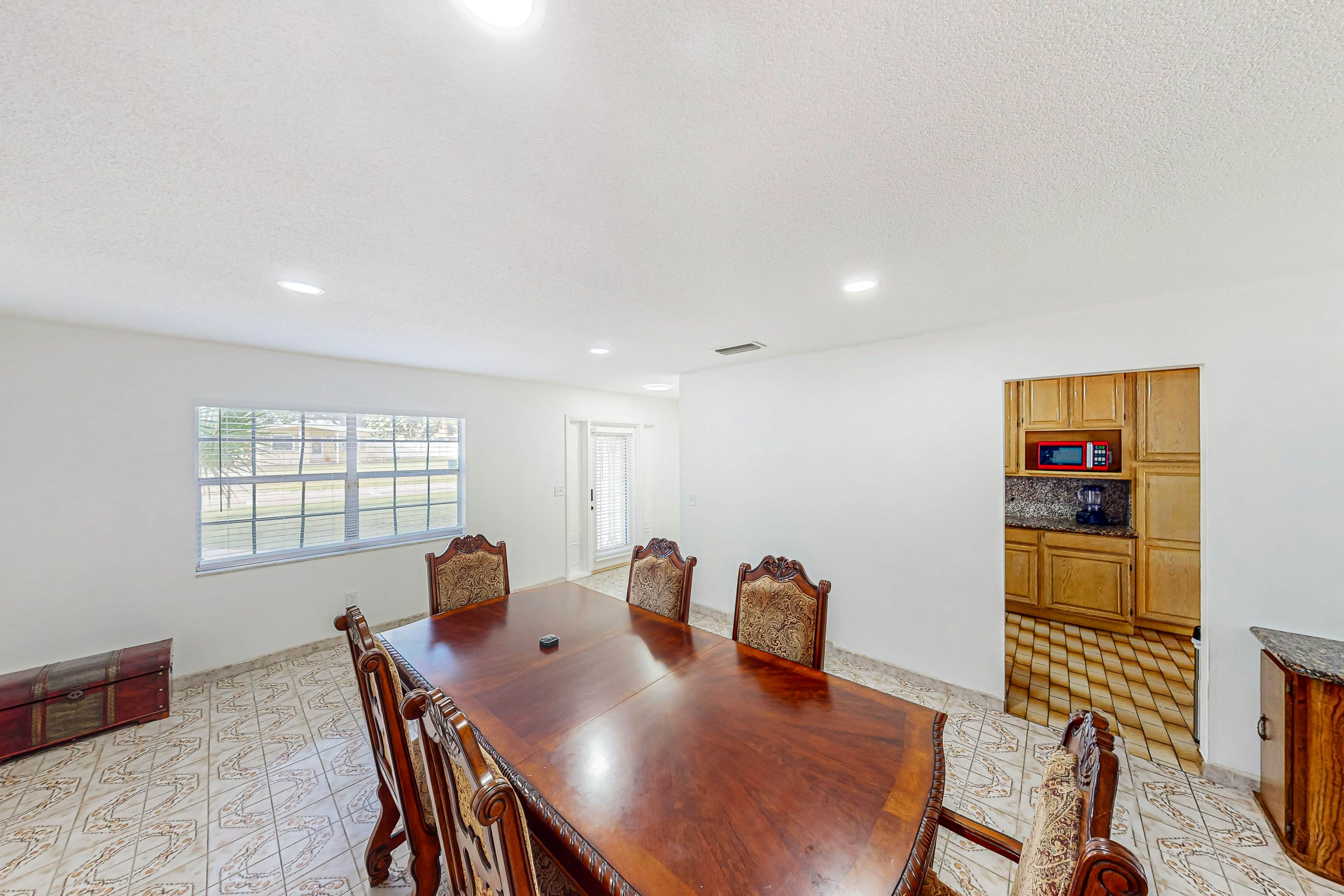 Conveniently located home with private pool, patio, foosball, & private W/D