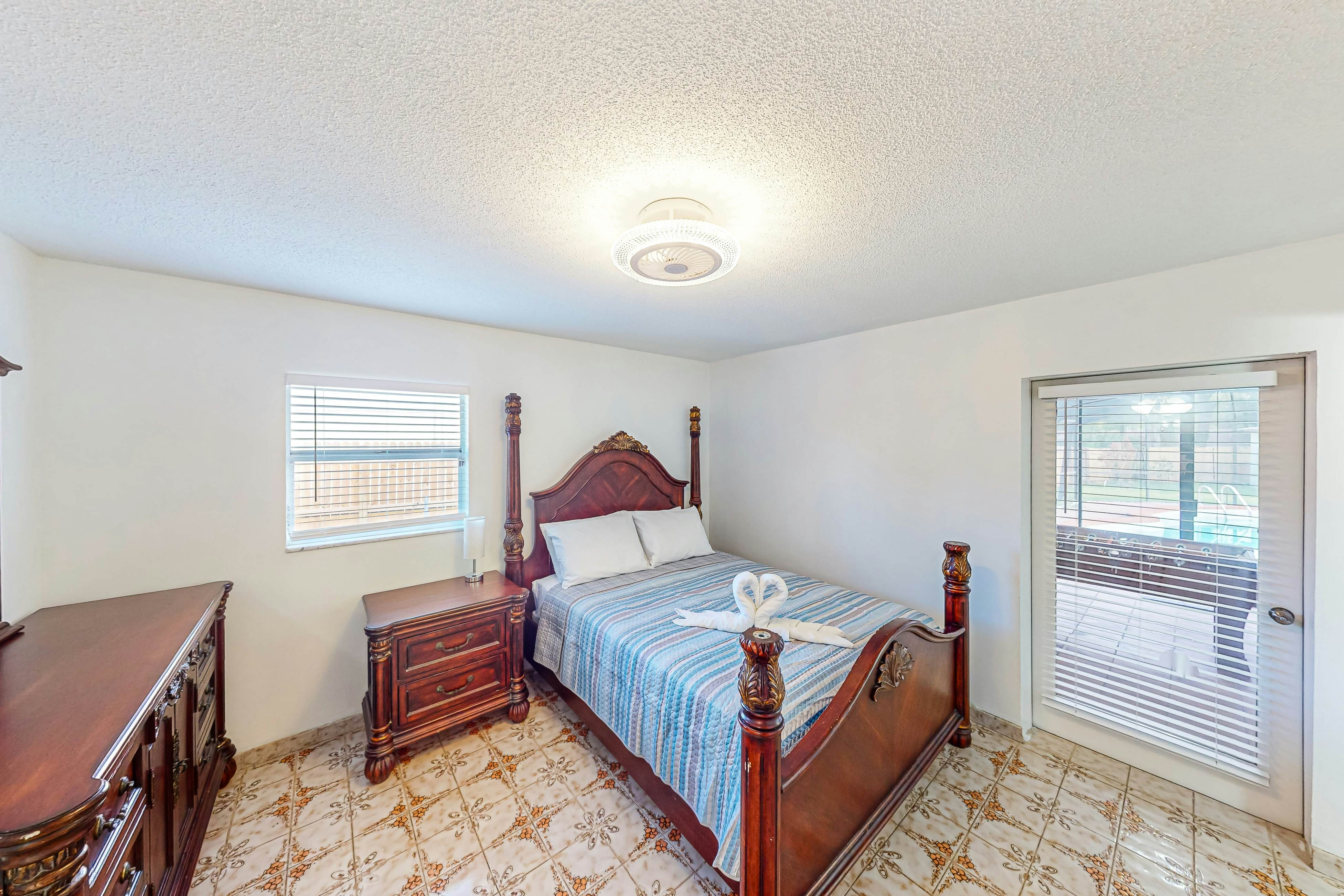 Conveniently located home with private pool, patio, foosball, & private W/D