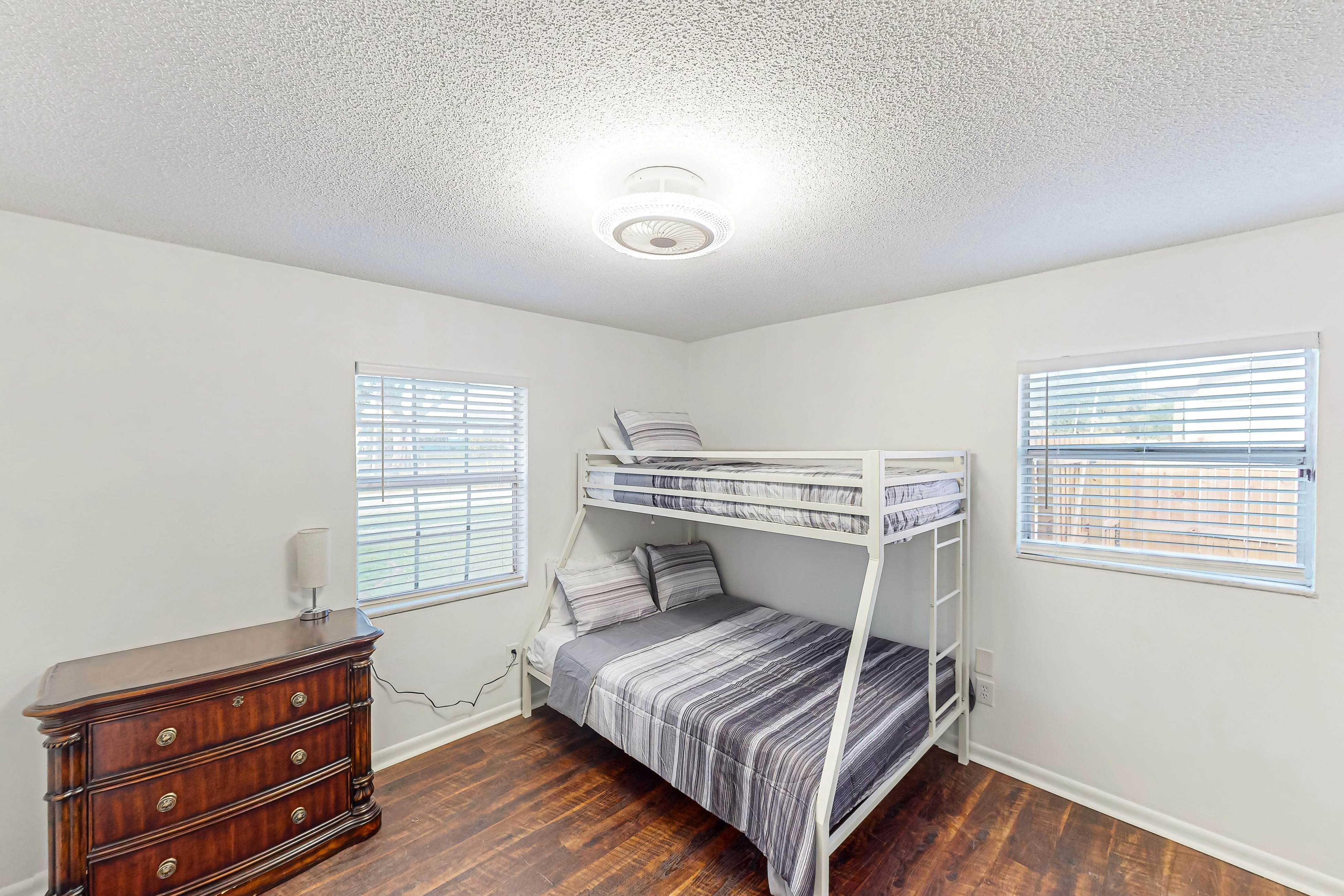 Conveniently located home with private pool, patio, foosball, & private W/D