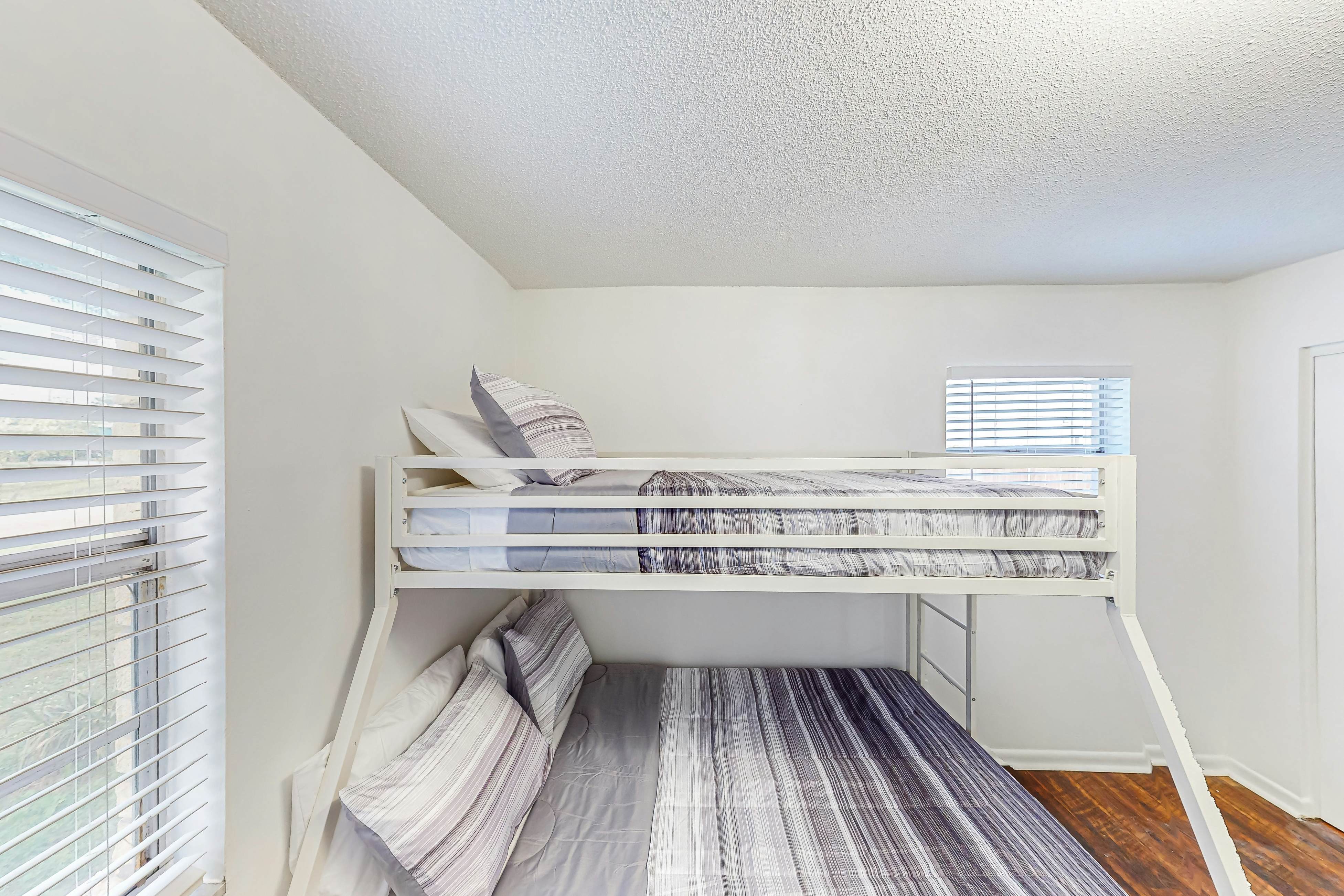 Conveniently located home with private pool, patio, foosball, & private W/D