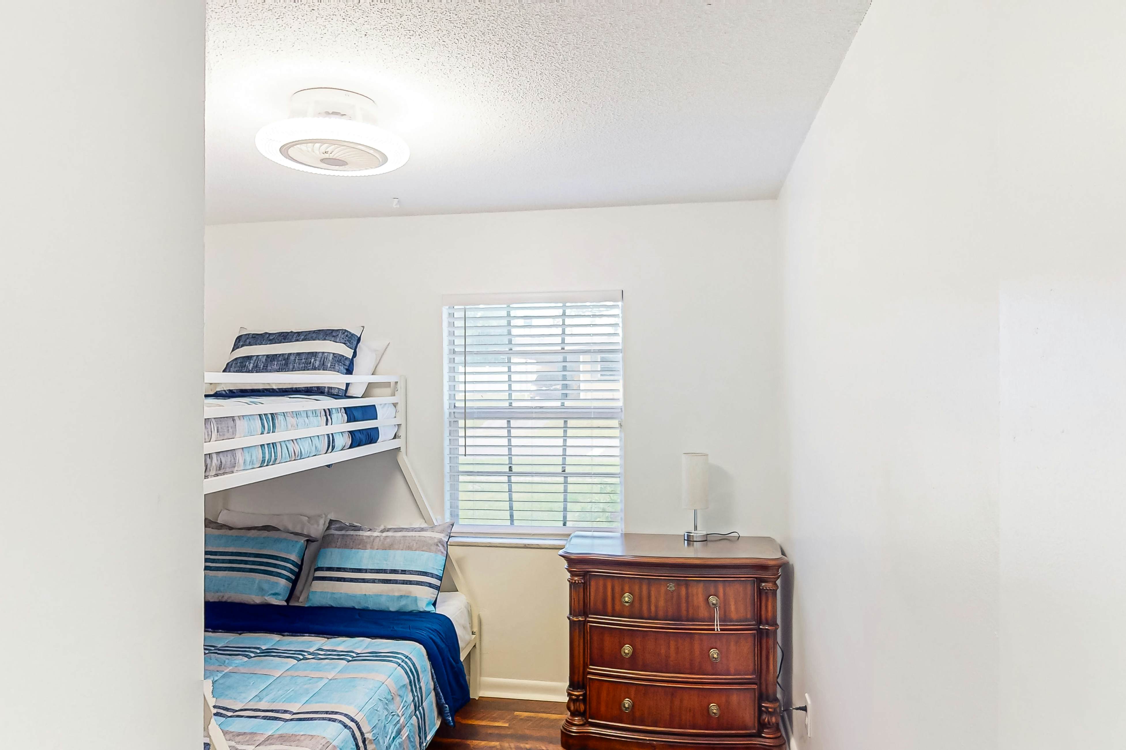 Conveniently located home with private pool, patio, foosball, & private W/D