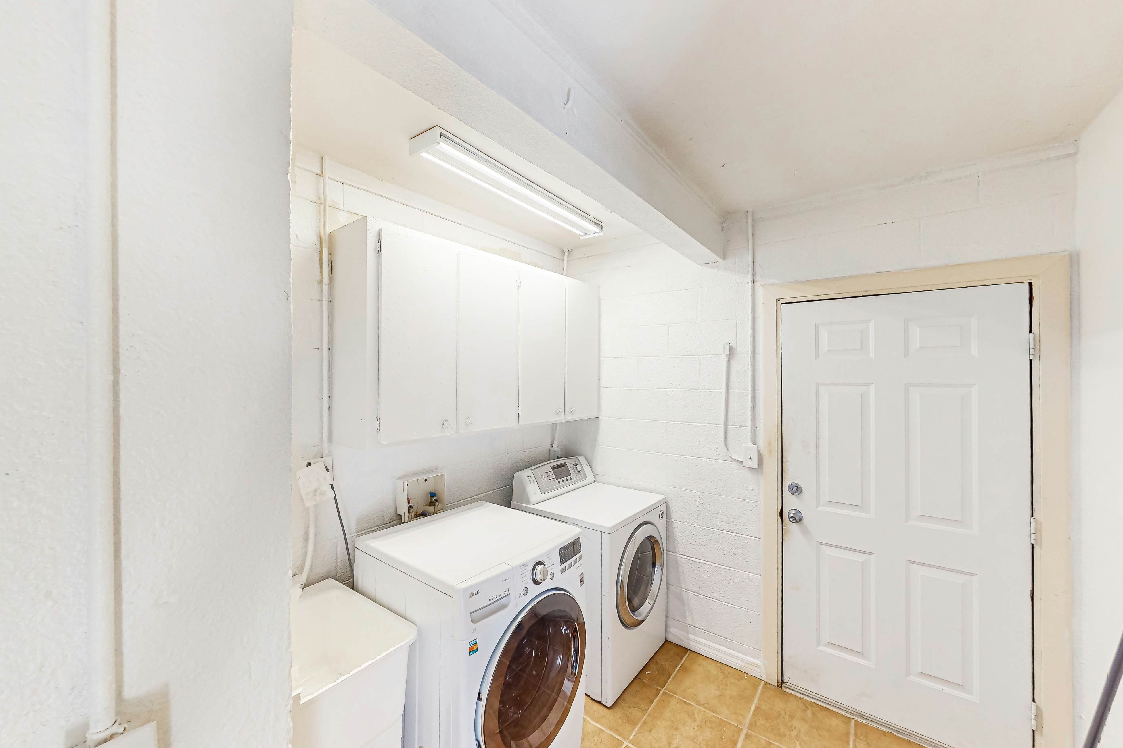 Conveniently located home with private pool, patio, foosball, & private W/D