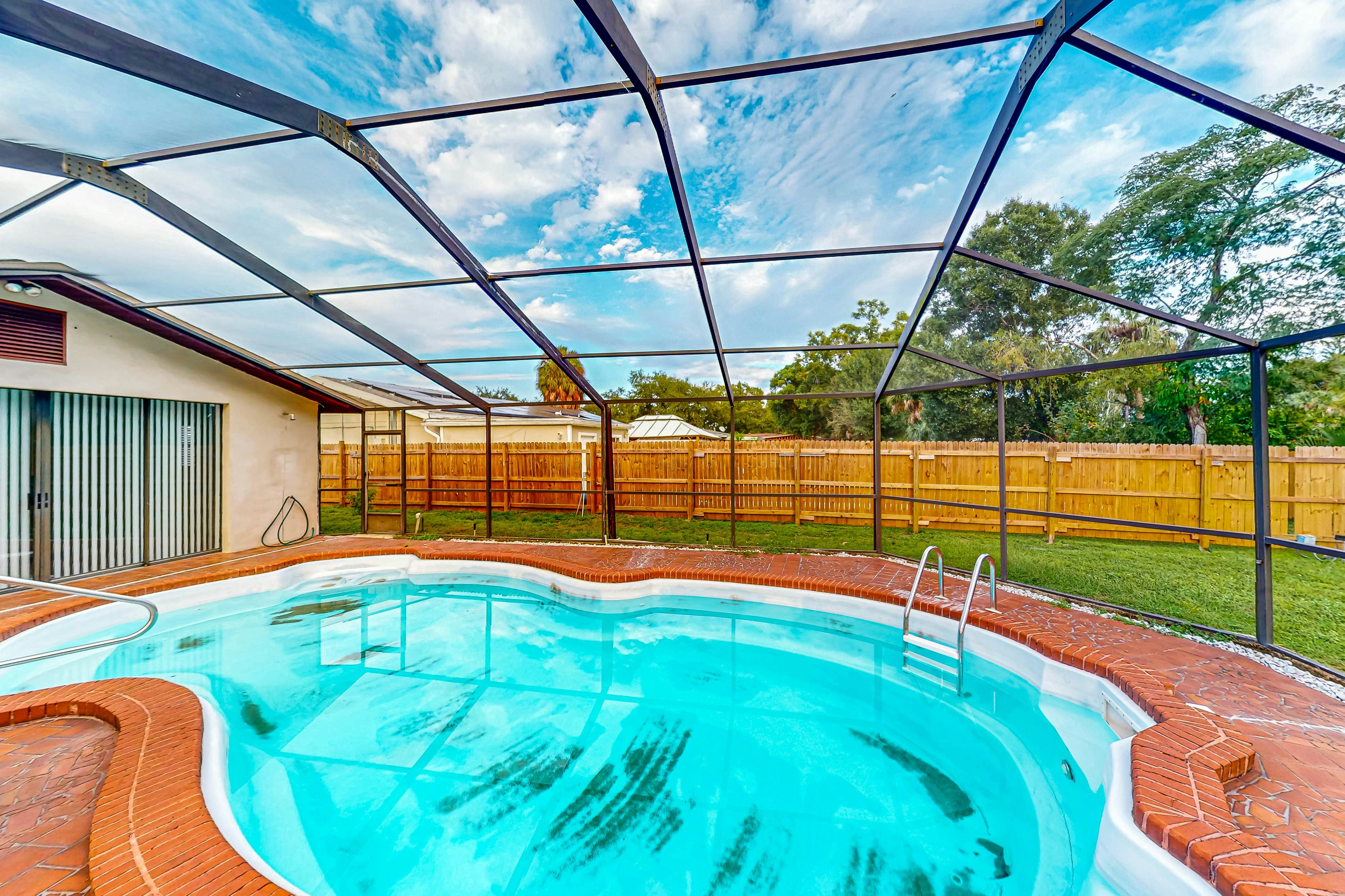 Conveniently located home with private pool, patio, foosball, & private W/D