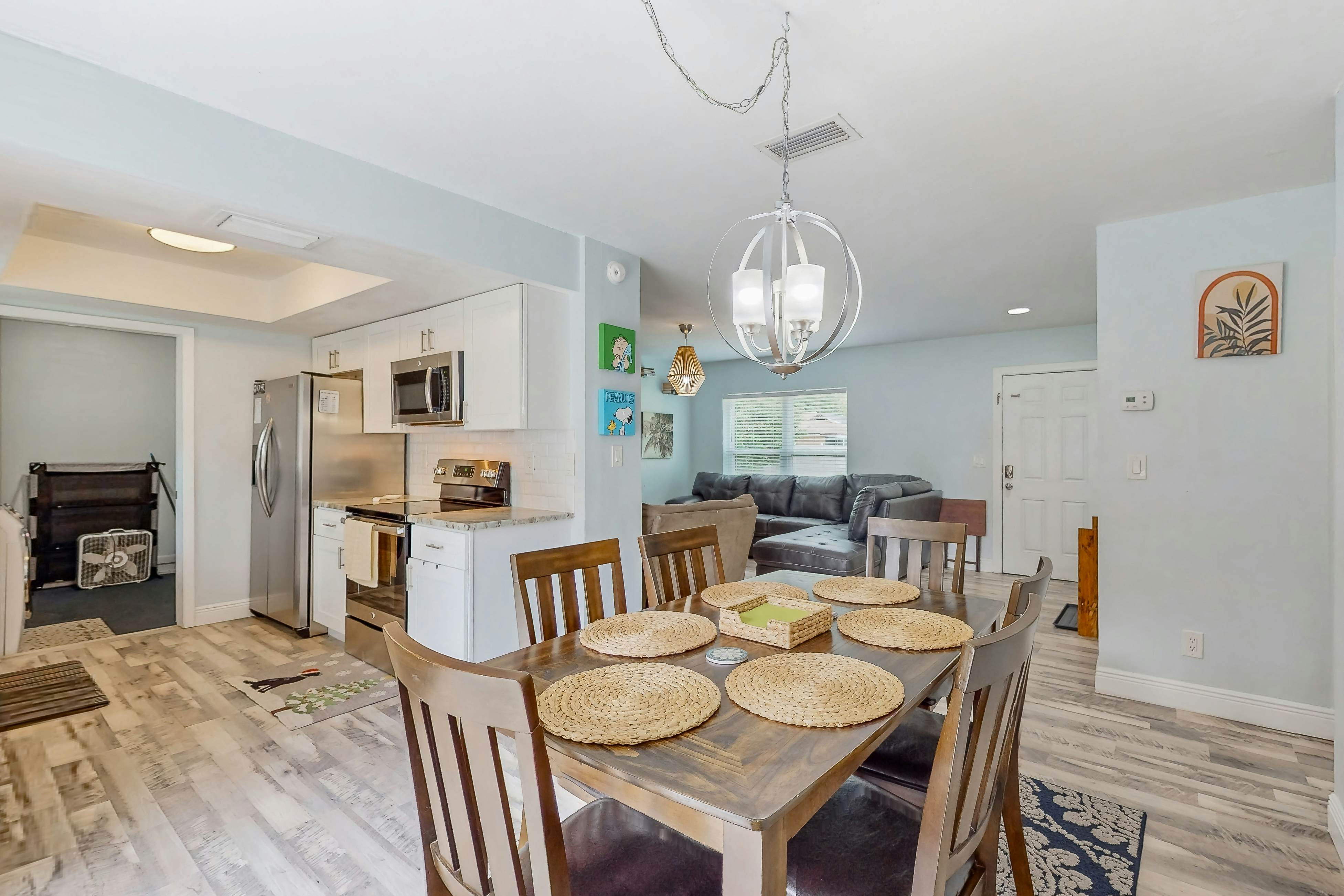 Dog-friendly home with fenced yard, firepit, washer/dryer, & central AC