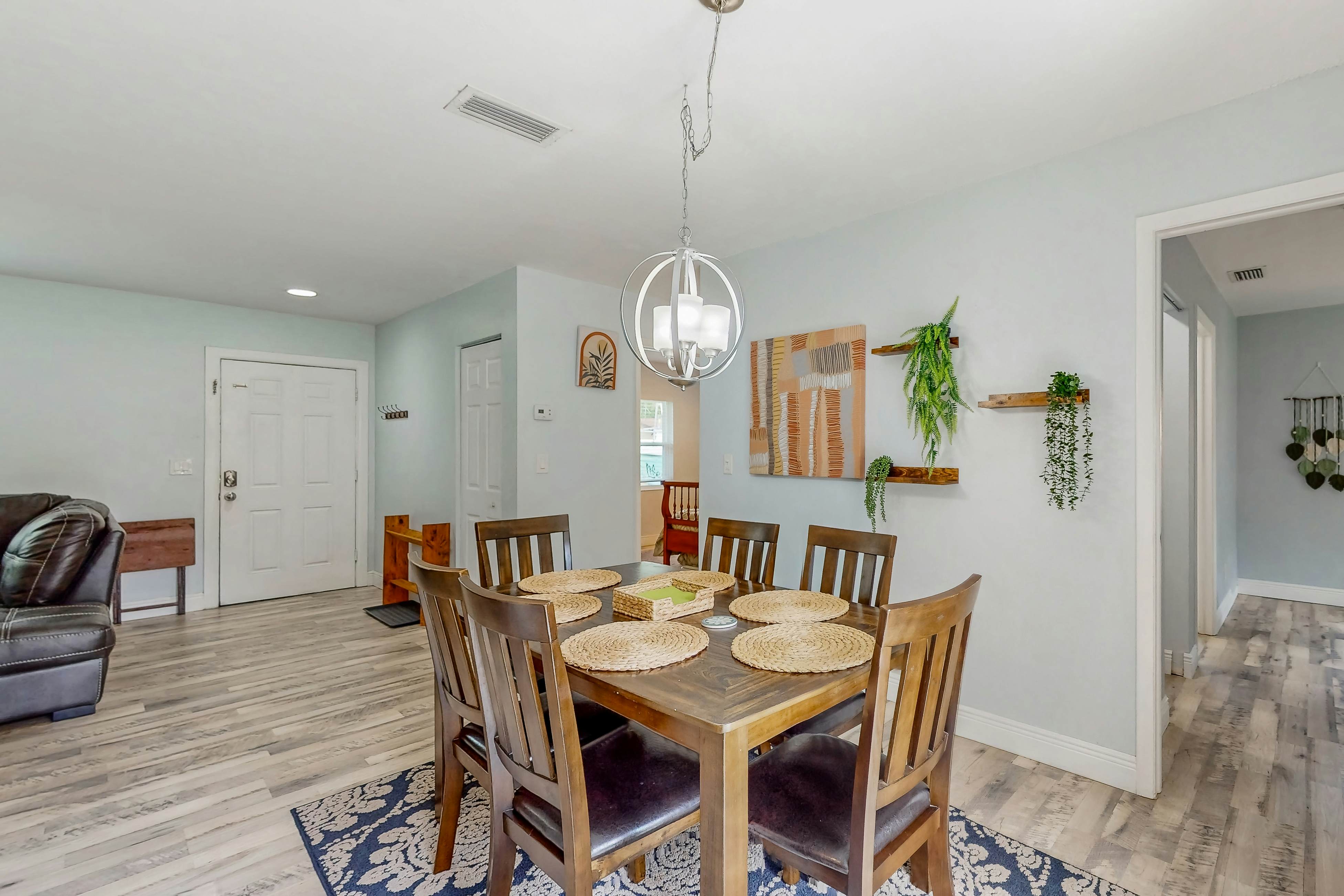 Dog-friendly home with fenced yard, firepit, washer/dryer, & central AC