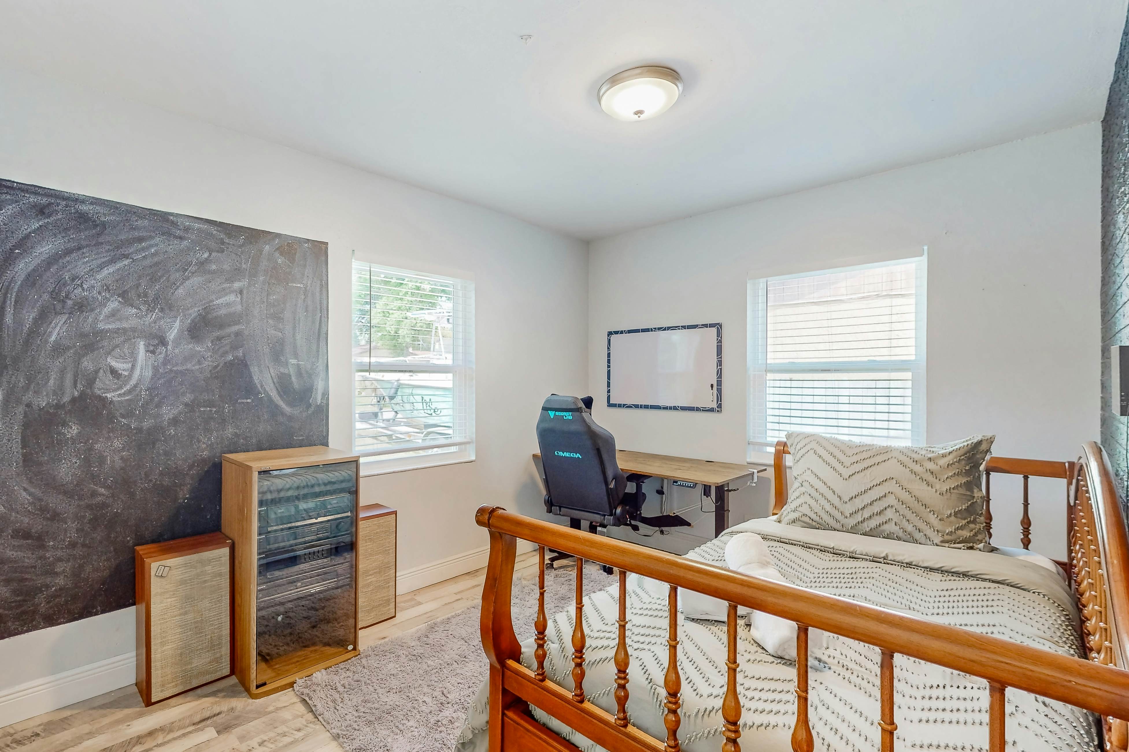 Dog-friendly home with fenced yard, firepit, washer/dryer, & central AC