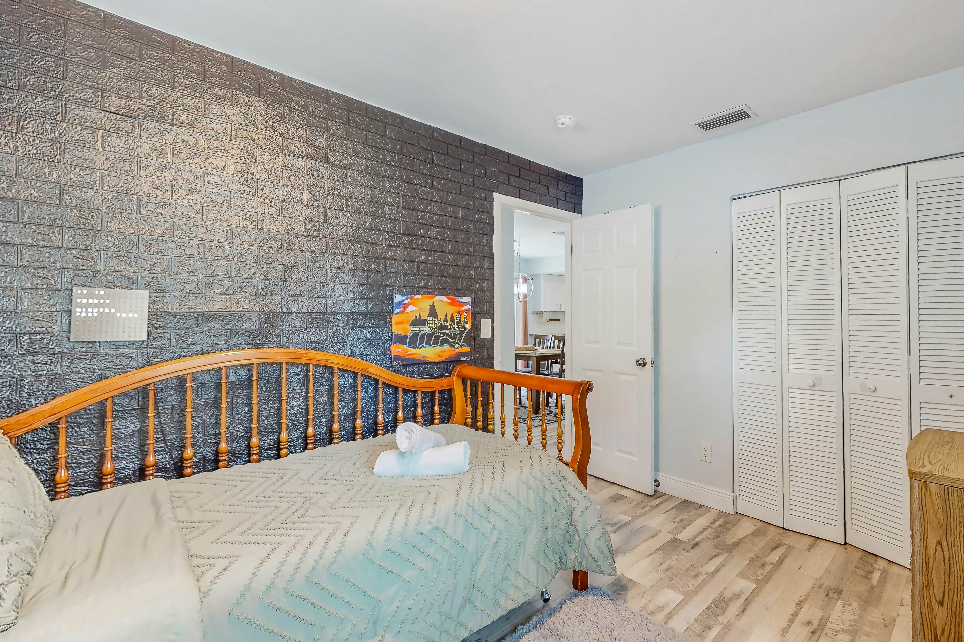 Dog-friendly home with fenced yard, firepit, washer/dryer, & central AC