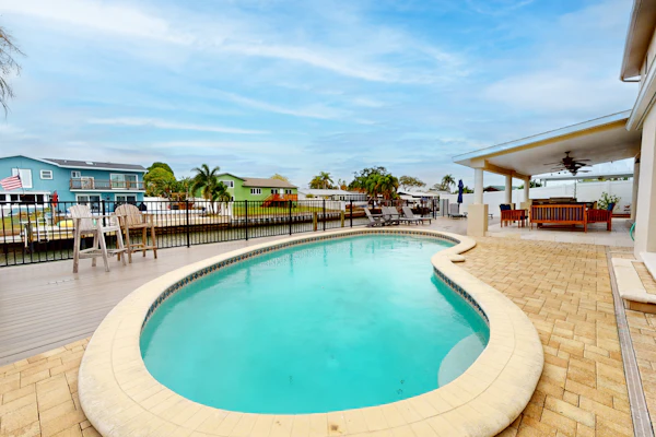 2 657 sq ft upscale canal home with pool dock and stunning main suite dog friendly