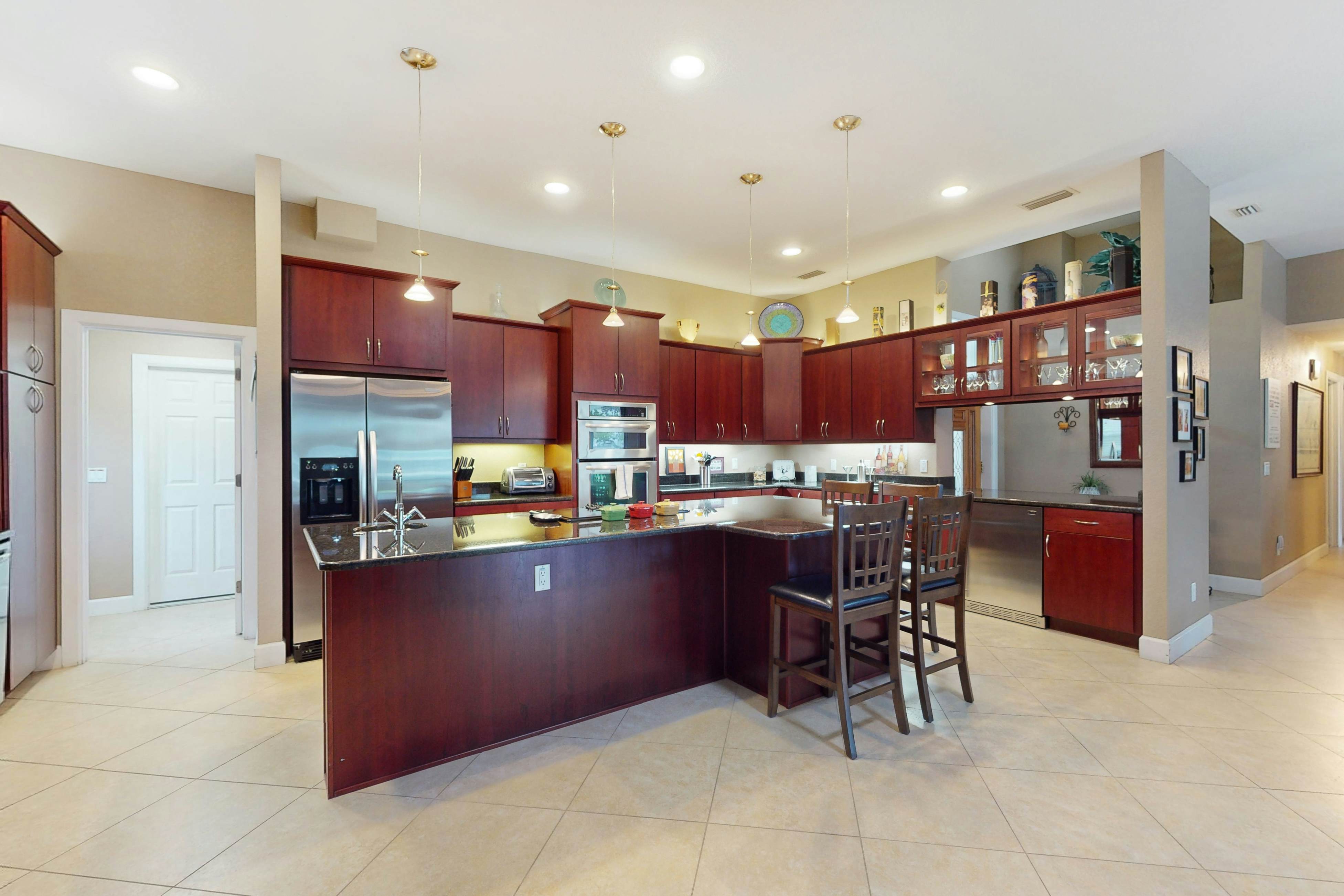 2,657-sq-ft upscale canal home with pool, dock & stunning main suite - dog-friendly