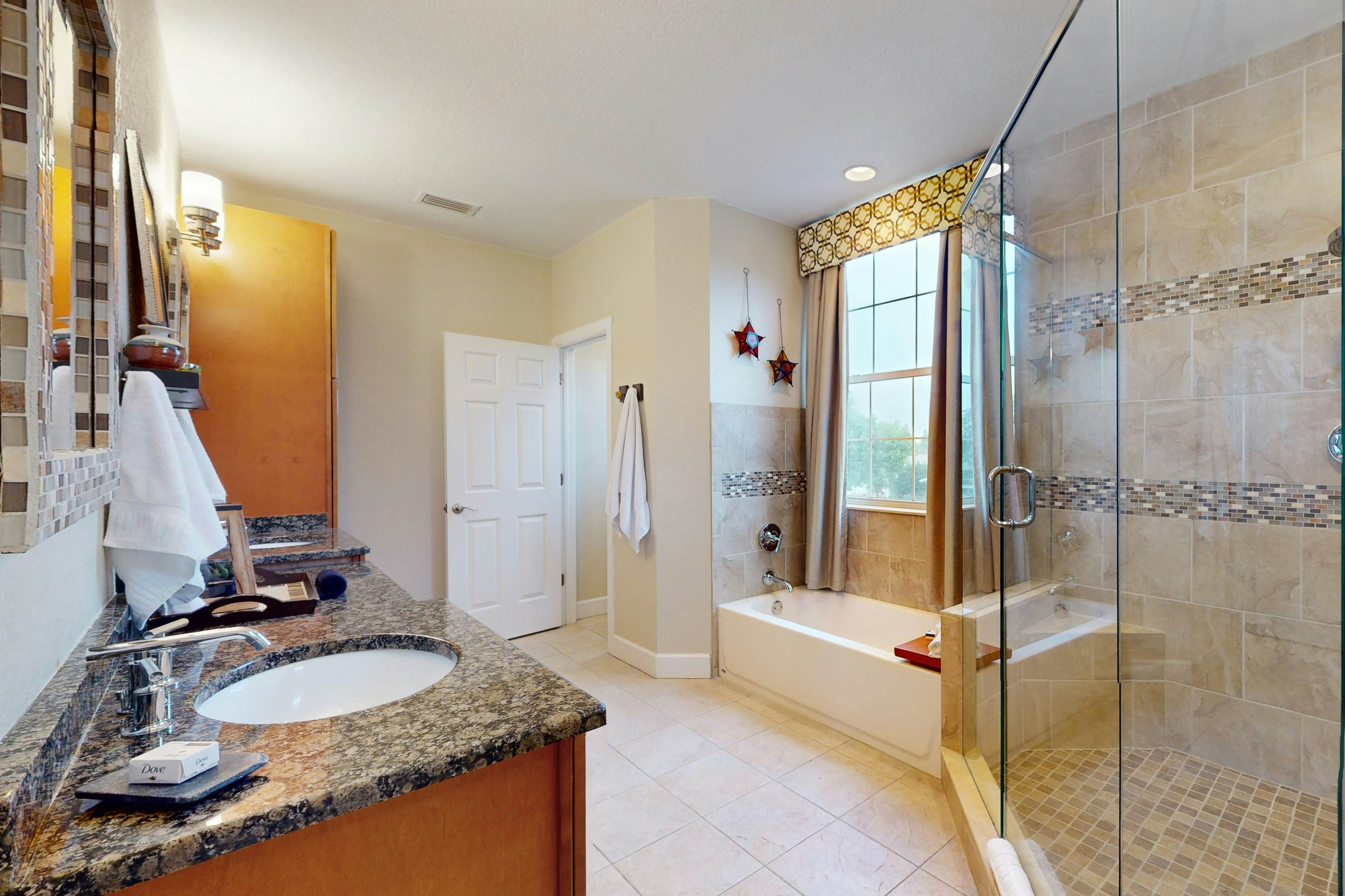 2,657-sq-ft upscale canal home with pool, dock & stunning main suite - dog-friendly