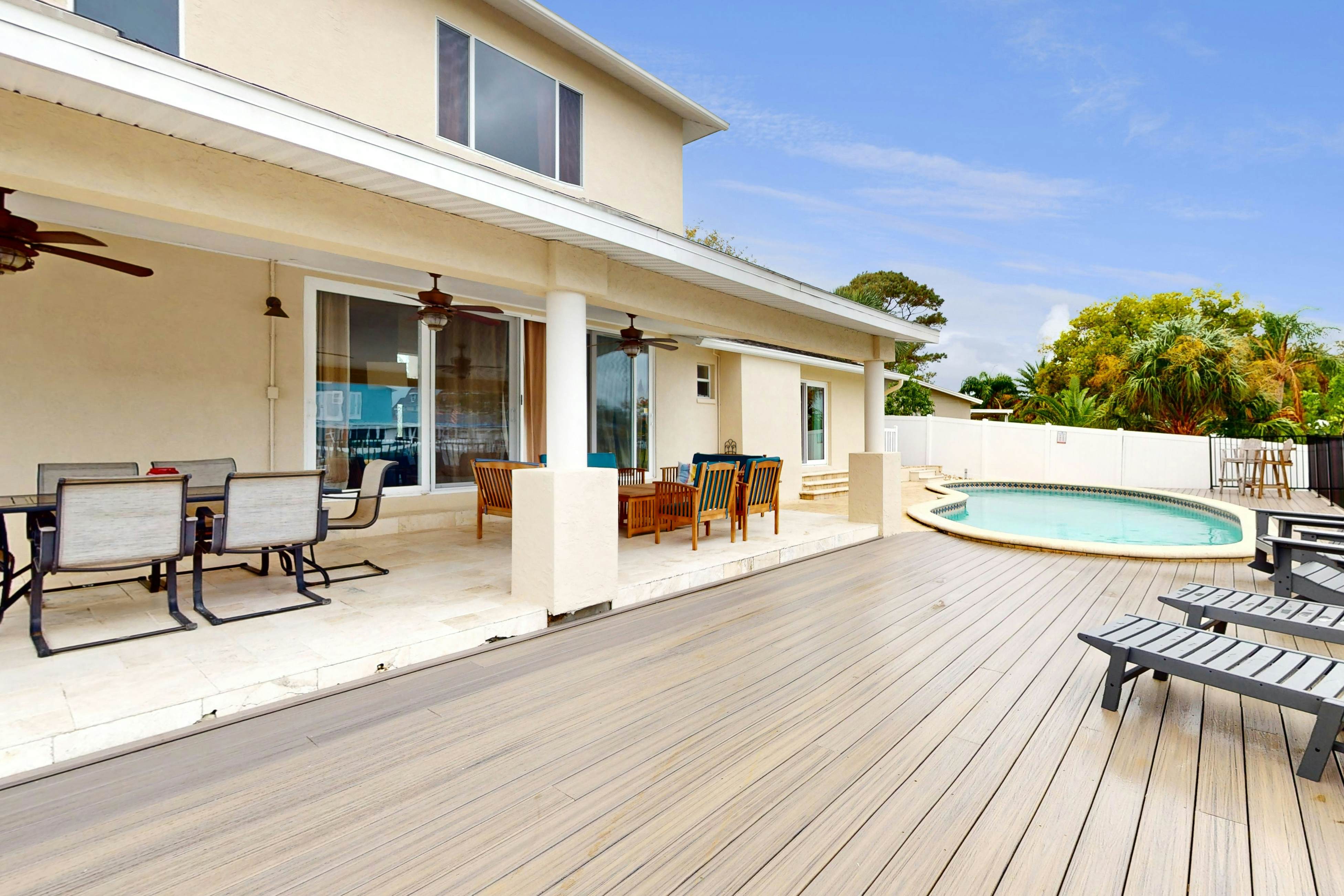 2,657-sq-ft upscale canal home with pool, dock & stunning main suite - dog-friendly