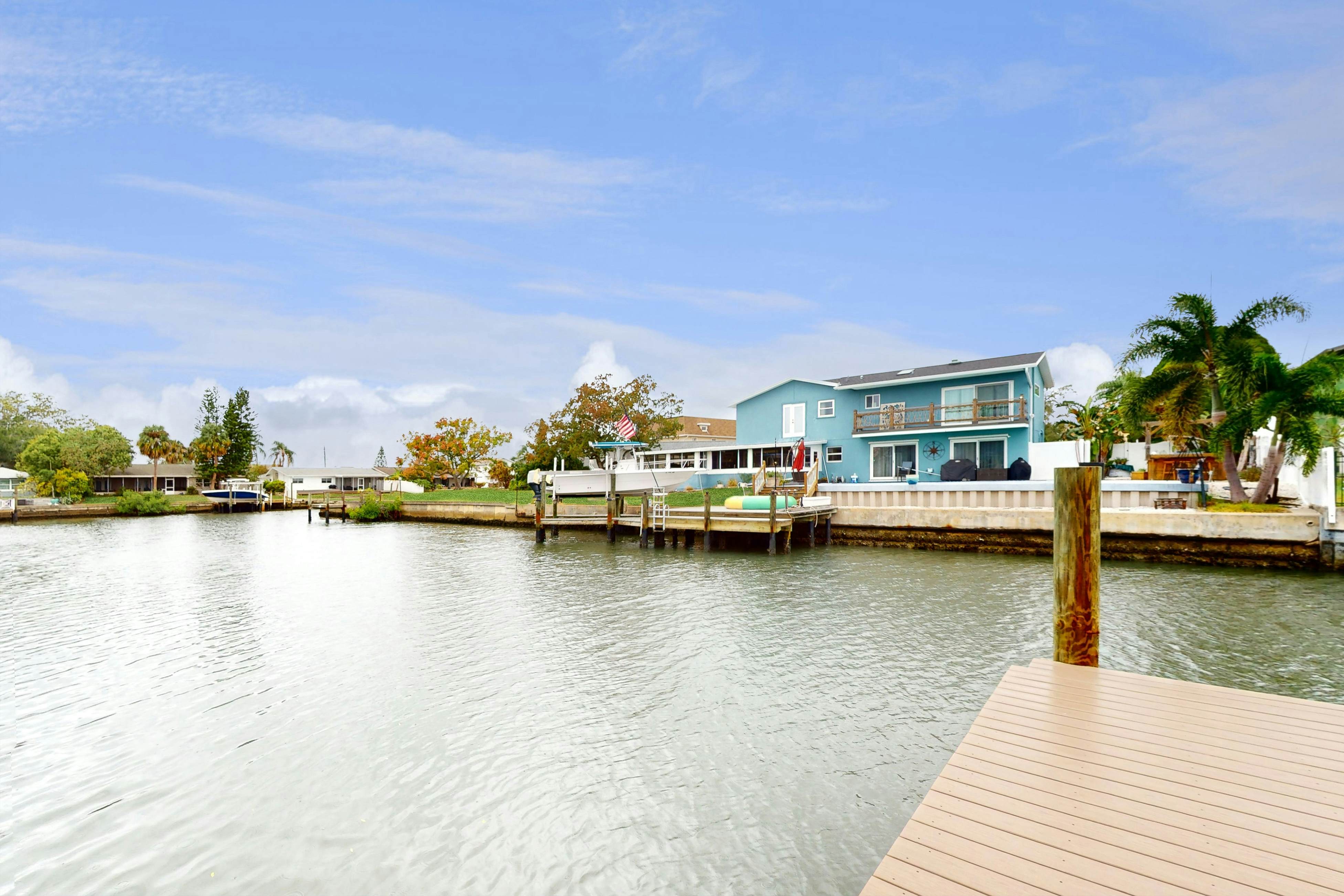 2,657-sq-ft upscale canal home with pool, dock & stunning main suite - dog-friendly