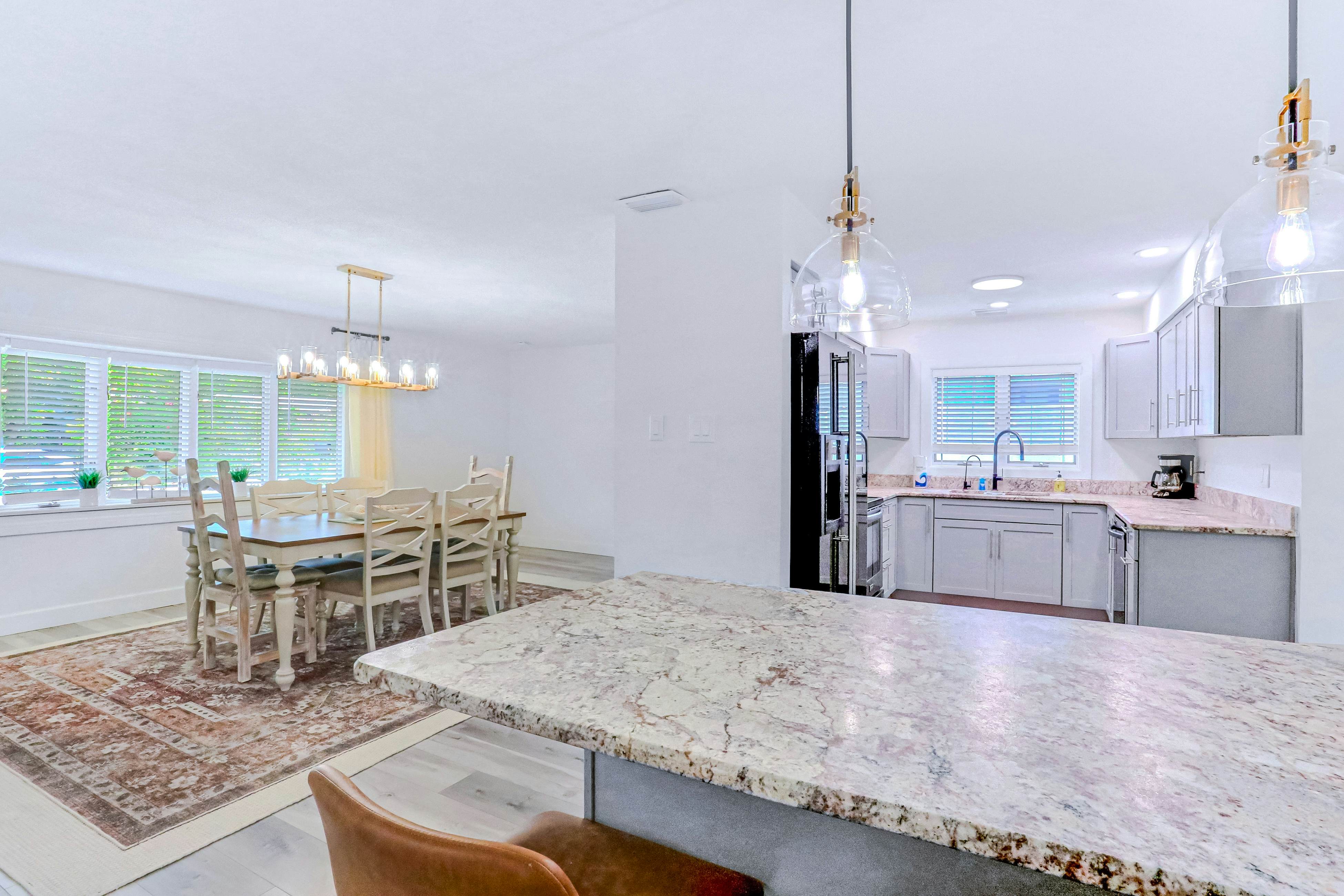 Large heated pool home with backyard oasis, dog friendly, AC and Wifi