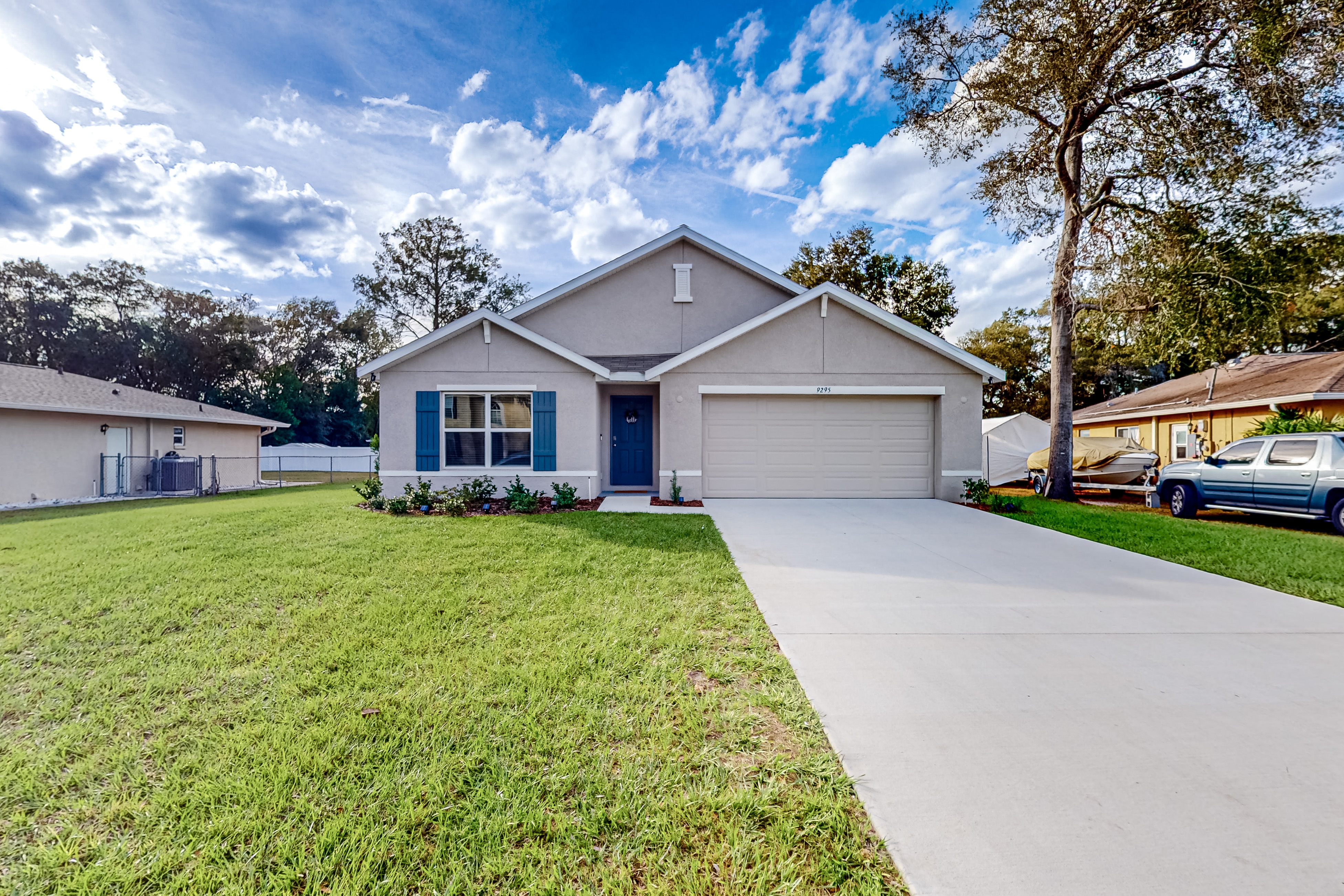 New home with large yard covered patio grill central AC and WD
