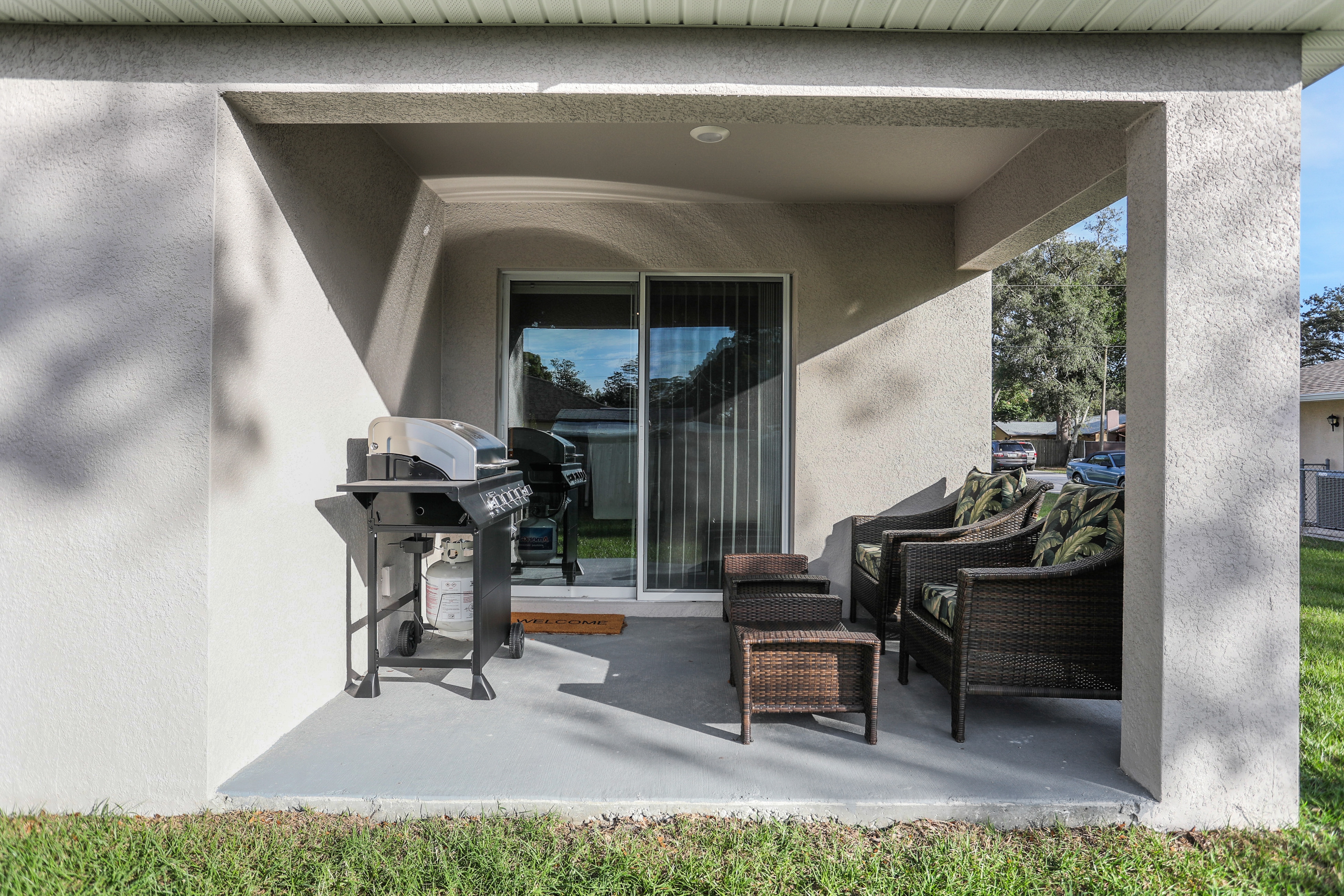 New home with large yard covered patio grill central AC and WD
