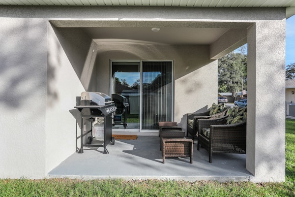 New home with large yard covered patio grill central AC and WD