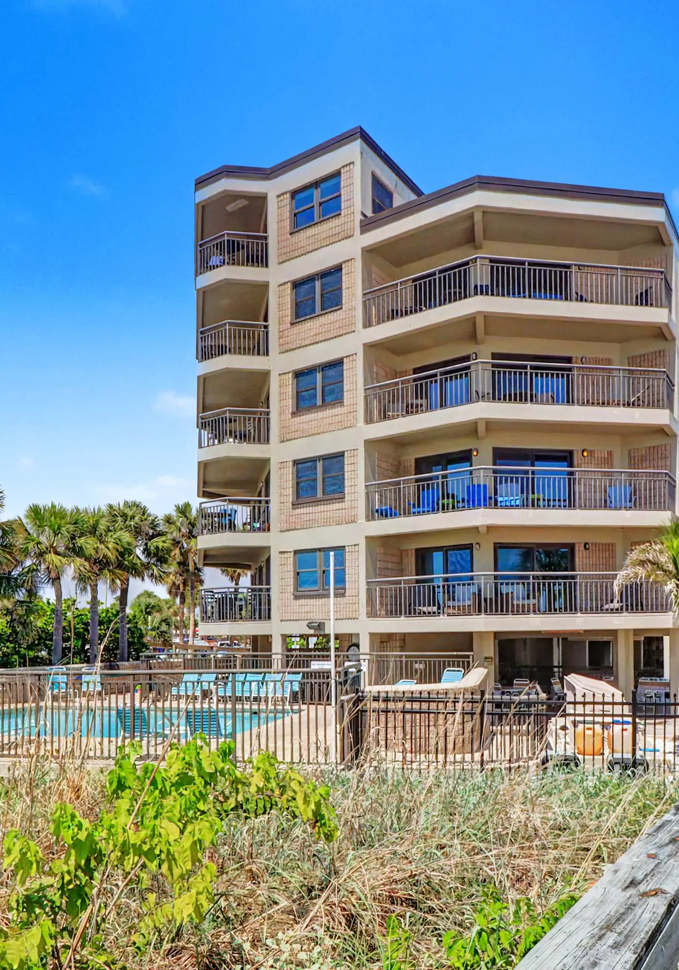 Contemporary gem on the Gulf Coast with balcony and WD walk to beach and shops