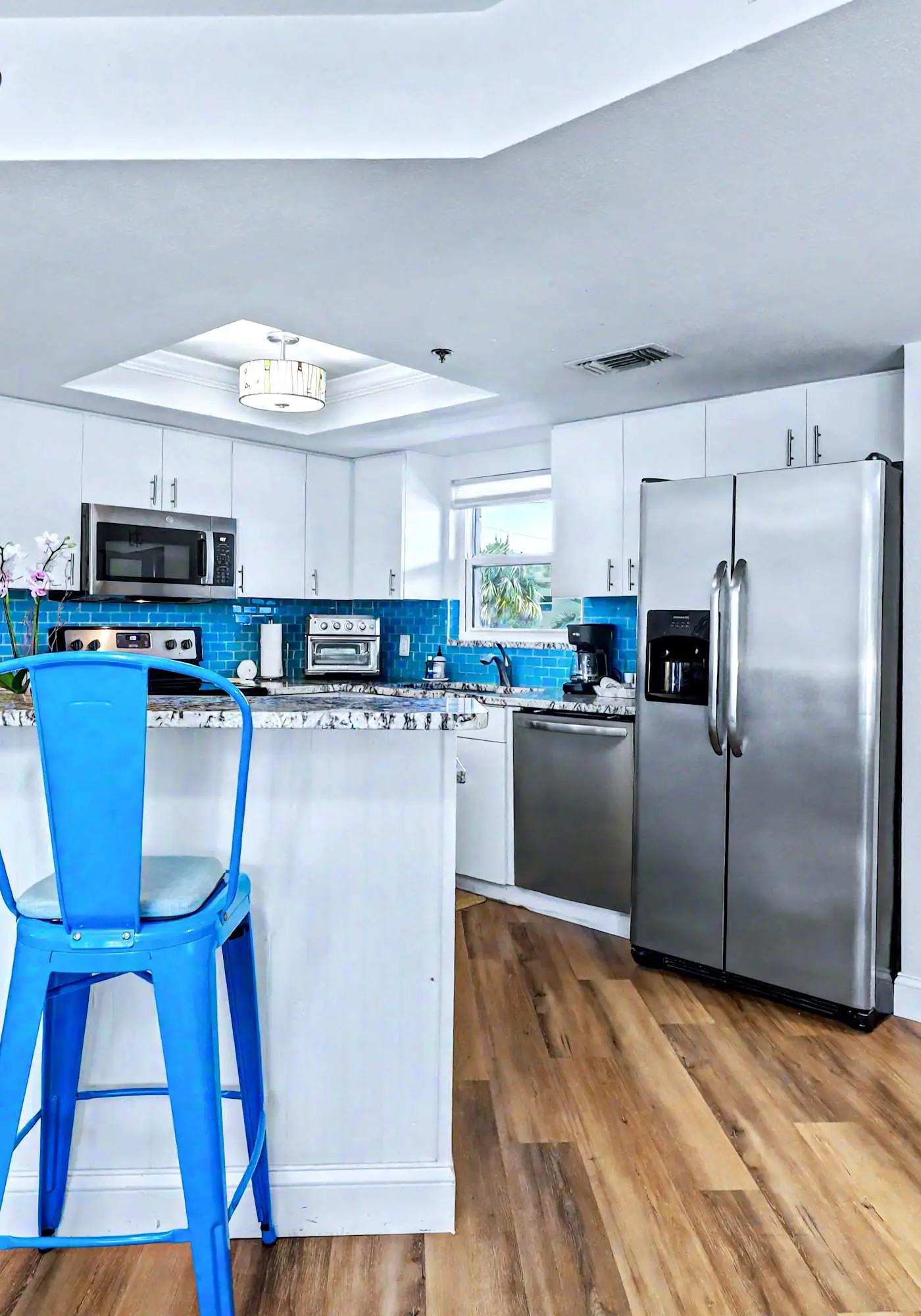 Contemporary gem on the Gulf Coast with balcony and WD walk to beach and shops