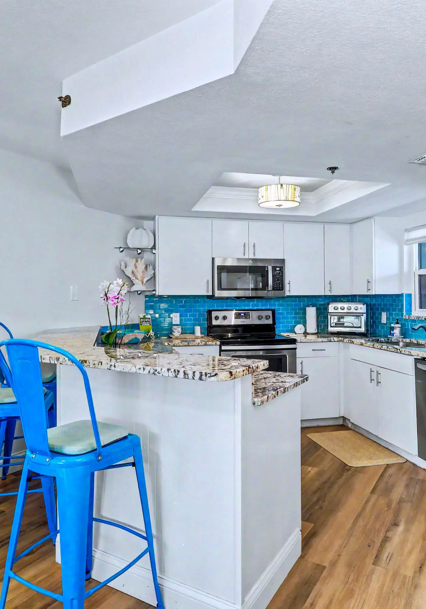 Contemporary gem on the Gulf Coast with balcony and WD walk to beach and shops