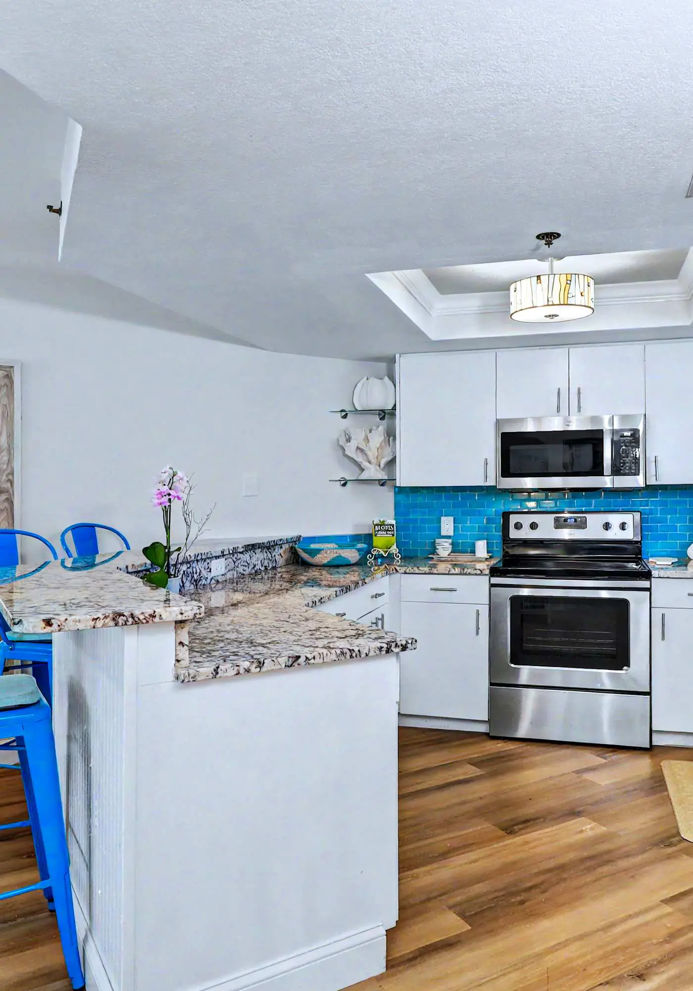 Contemporary gem on the Gulf Coast with balcony and WD walk to beach and shops