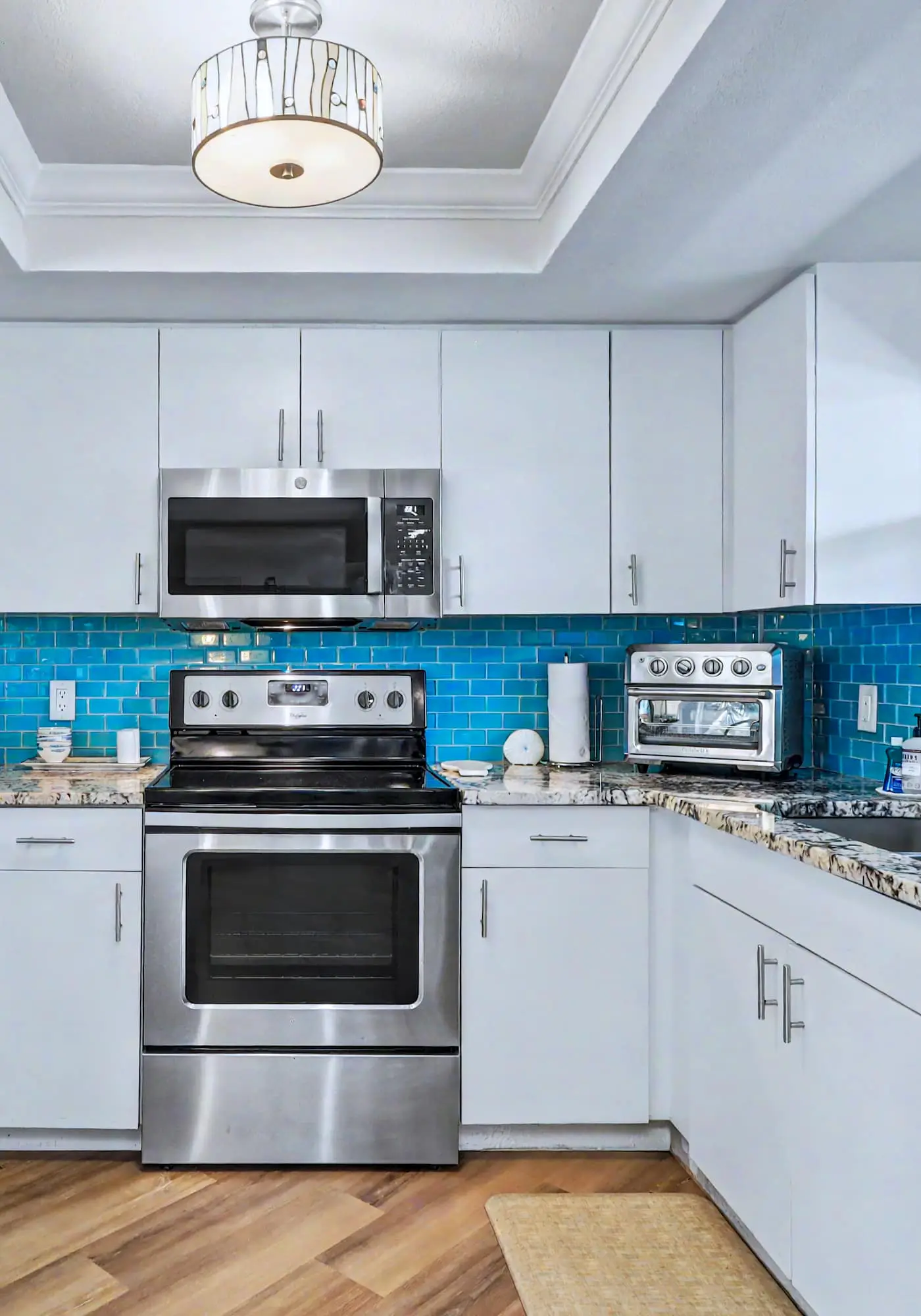 Contemporary gem on the Gulf Coast with balcony and WD walk to beach and shops