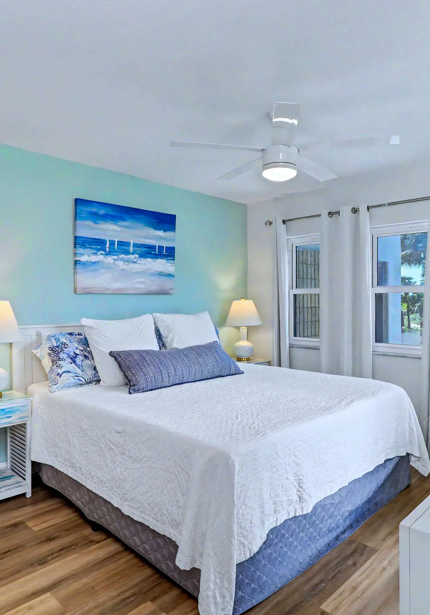 Contemporary gem on the Gulf Coast with balcony and WD walk to beach and shops