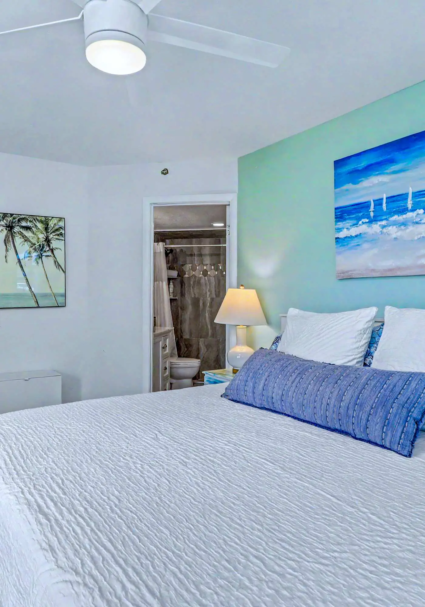 Contemporary gem on the Gulf Coast with balcony and WD walk to beach and shops