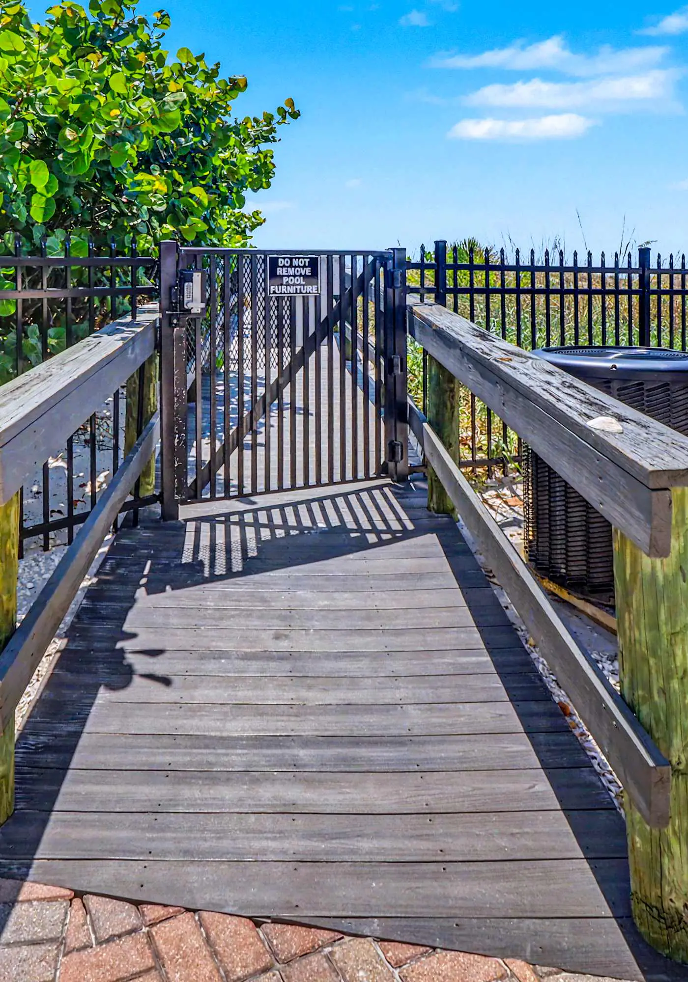 Contemporary gem on the Gulf Coast with balcony and WD walk to beach and shops