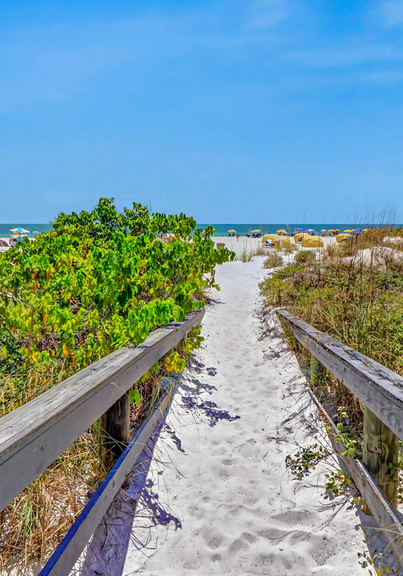 Contemporary gem on the Gulf Coast with balcony and WD walk to beach and shops
