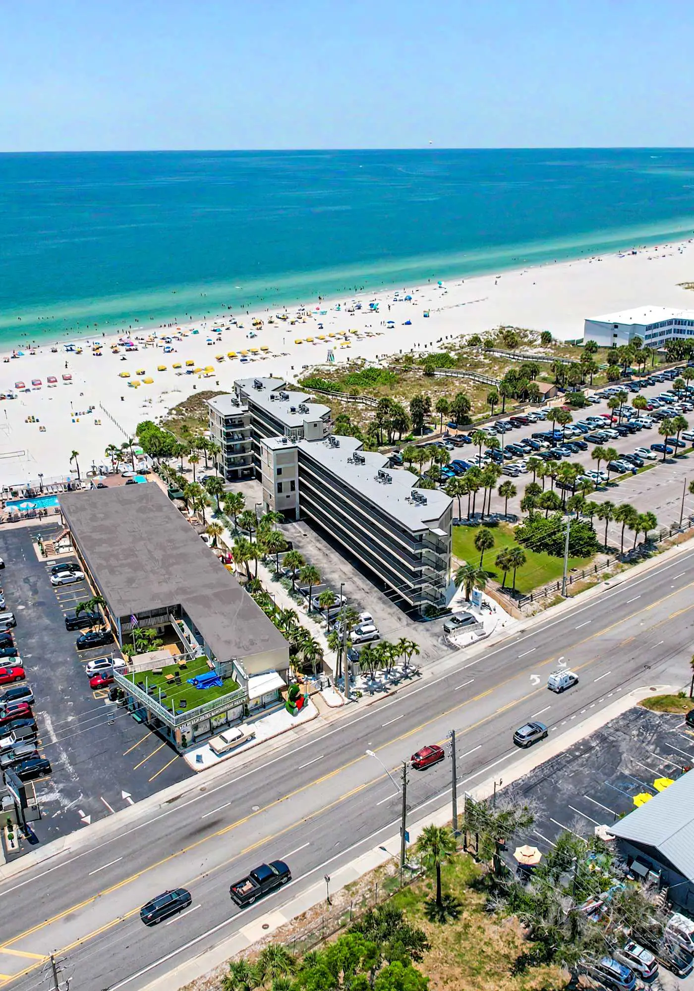 Contemporary gem on the Gulf Coast with balcony and WD walk to beach and shops