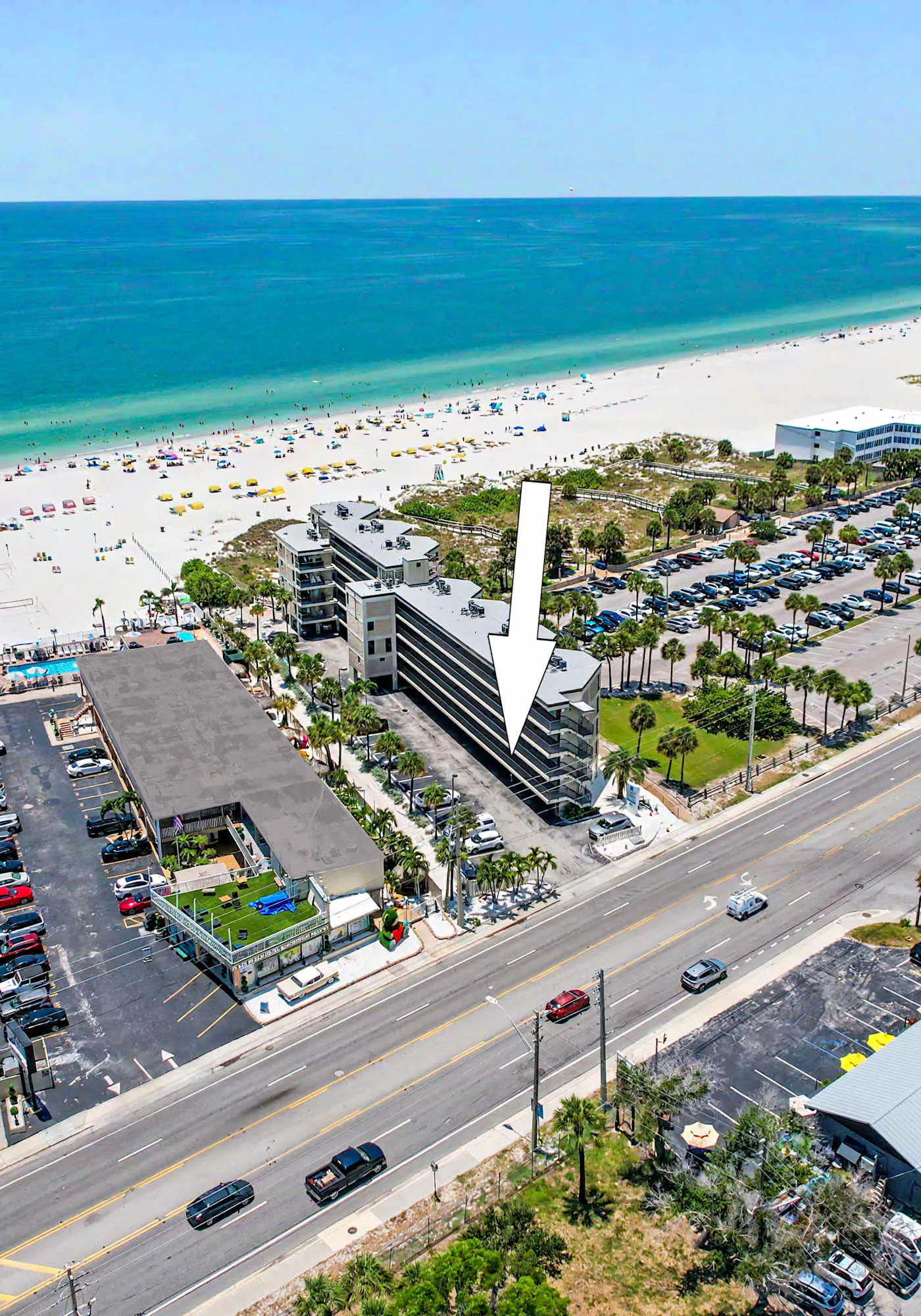 Contemporary gem on the Gulf Coast with balcony and WD walk to beach and shops