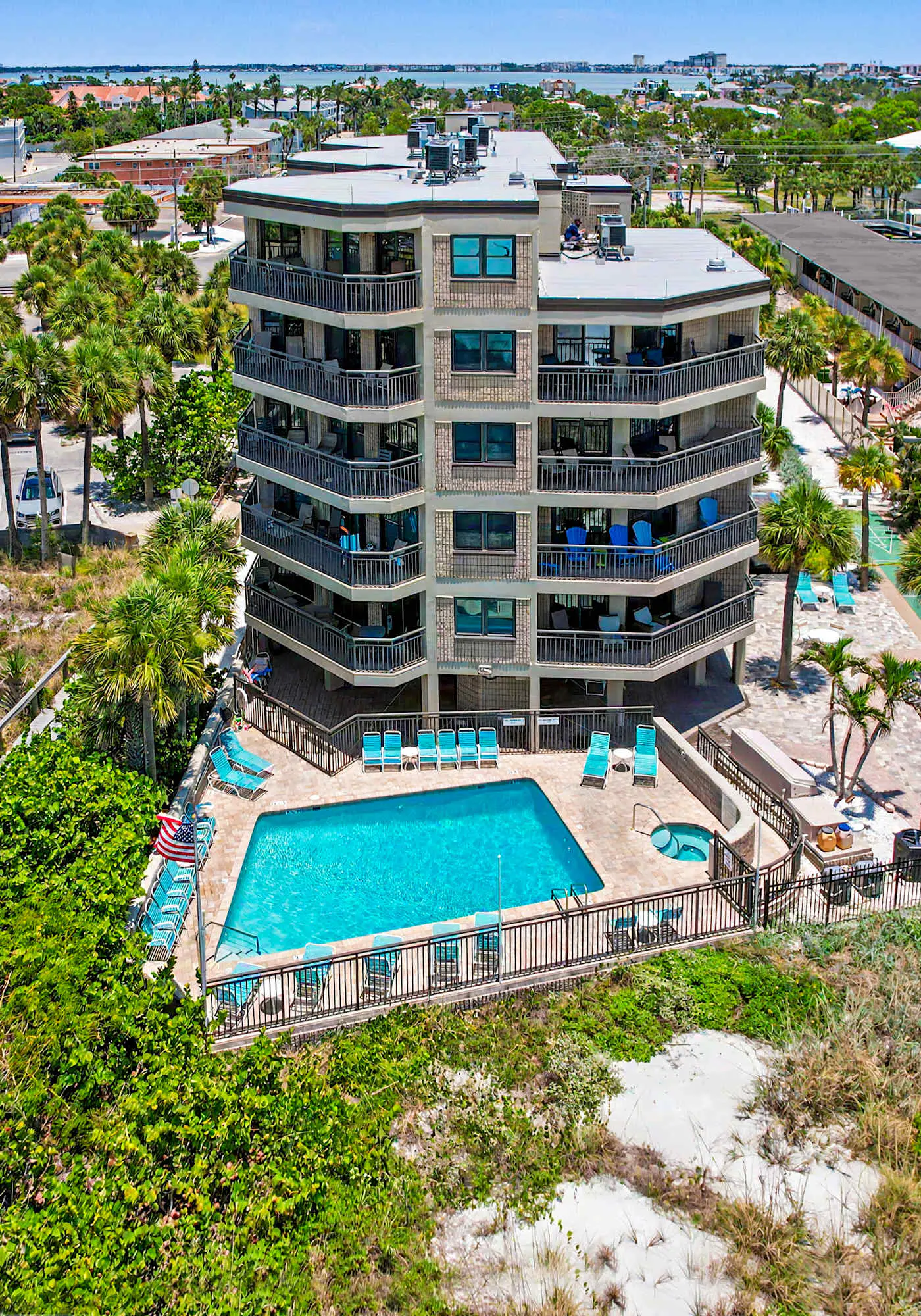 Contemporary gem on the Gulf Coast with balcony and WD walk to beach and shops