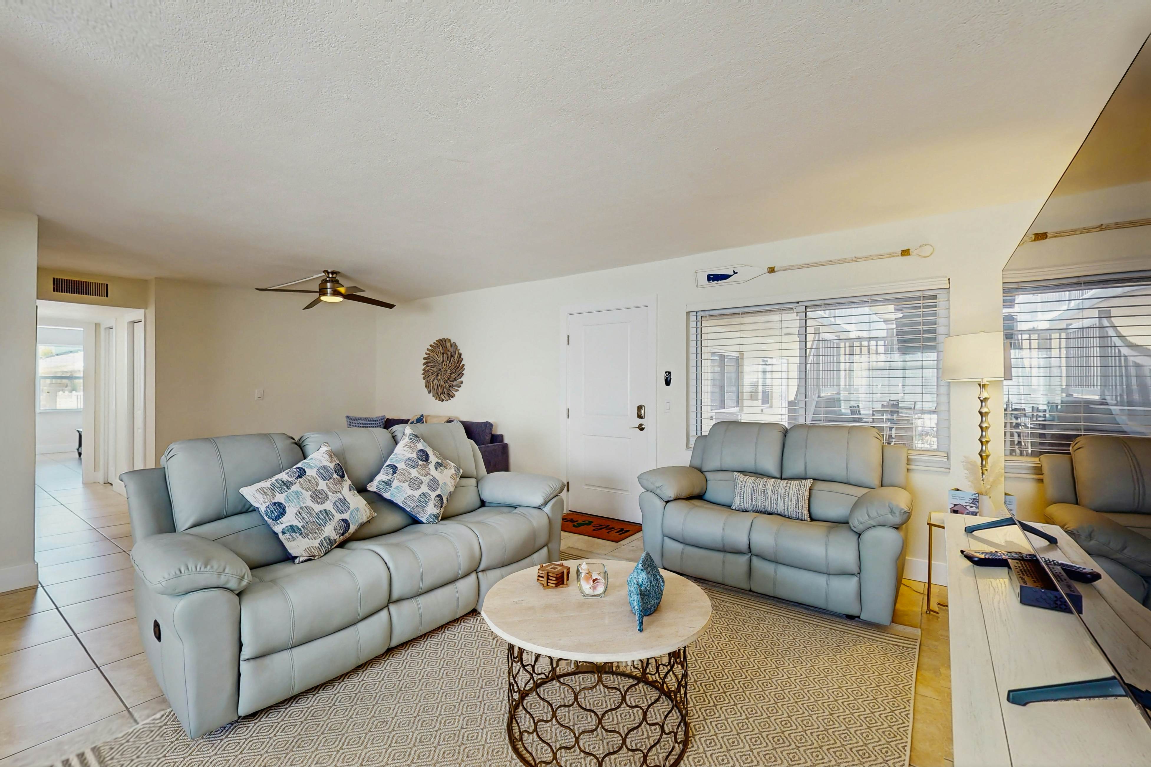 Ground-floor getaway with a heated pool & central AC - walk to the beach