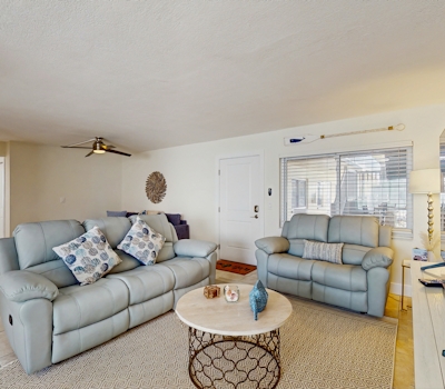 Ground floor getaway with a heated pool and central AC walk to the beach