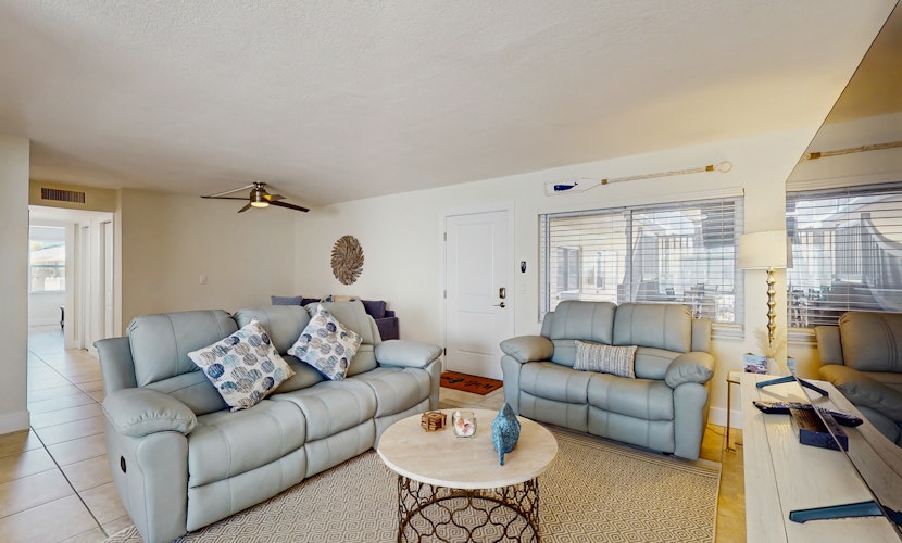 Ground floor getaway with a heated pool and central AC walk to the beach