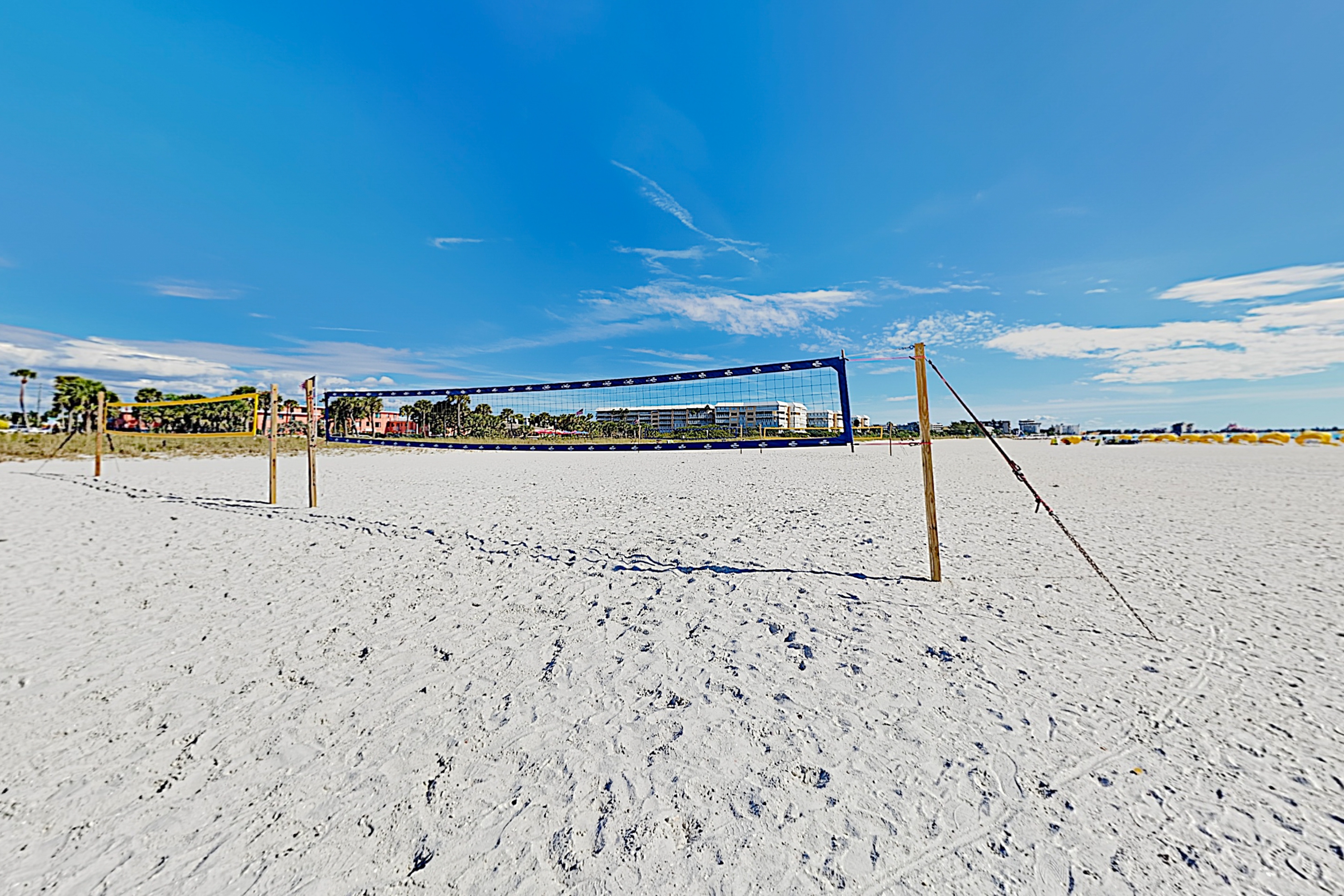 Ground floor getaway with a heated pool and central AC walk to the beach