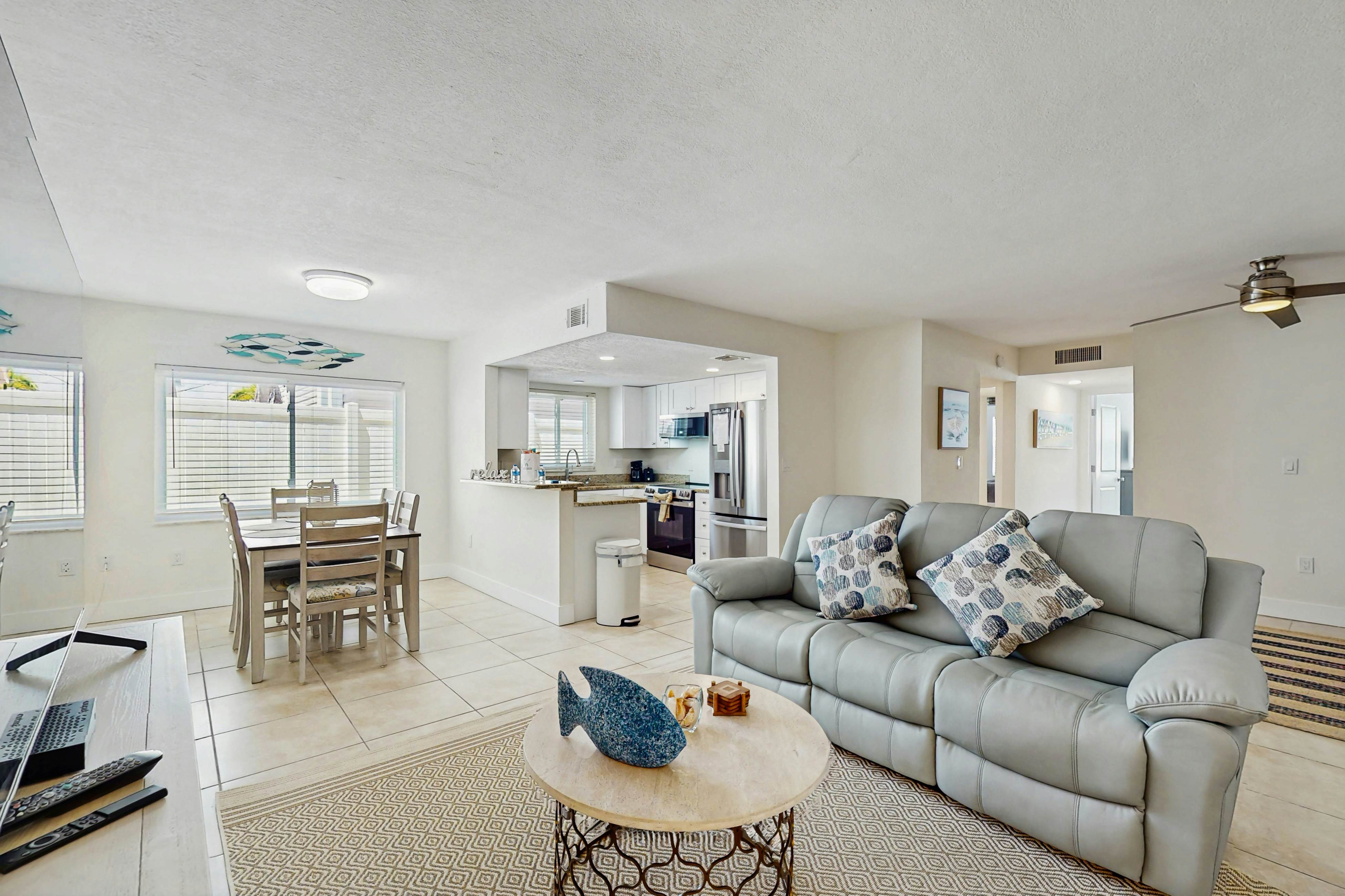 Ground-floor getaway with a heated pool & central AC - walk to the beach