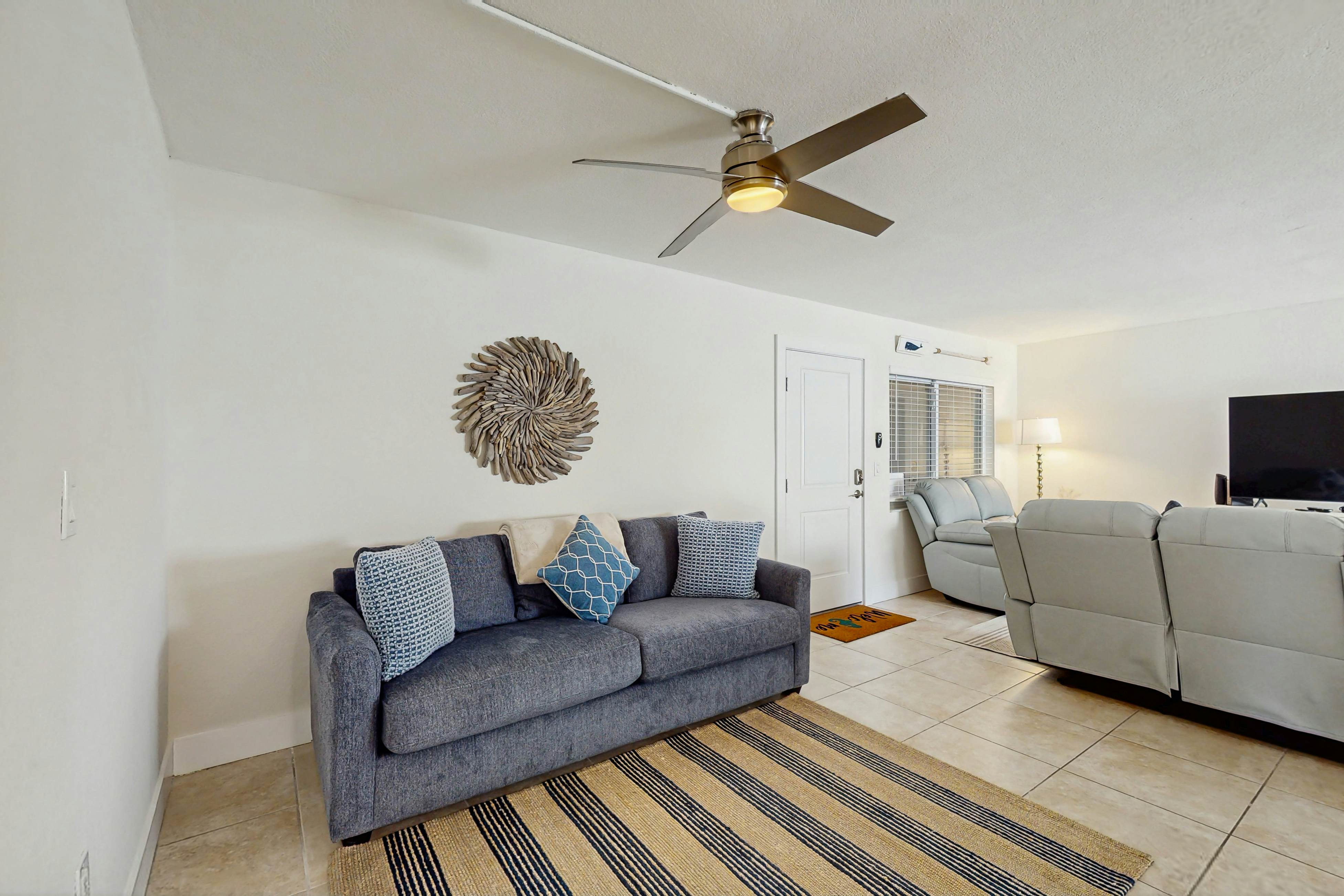 Ground-floor getaway with a heated pool & central AC - walk to the beach