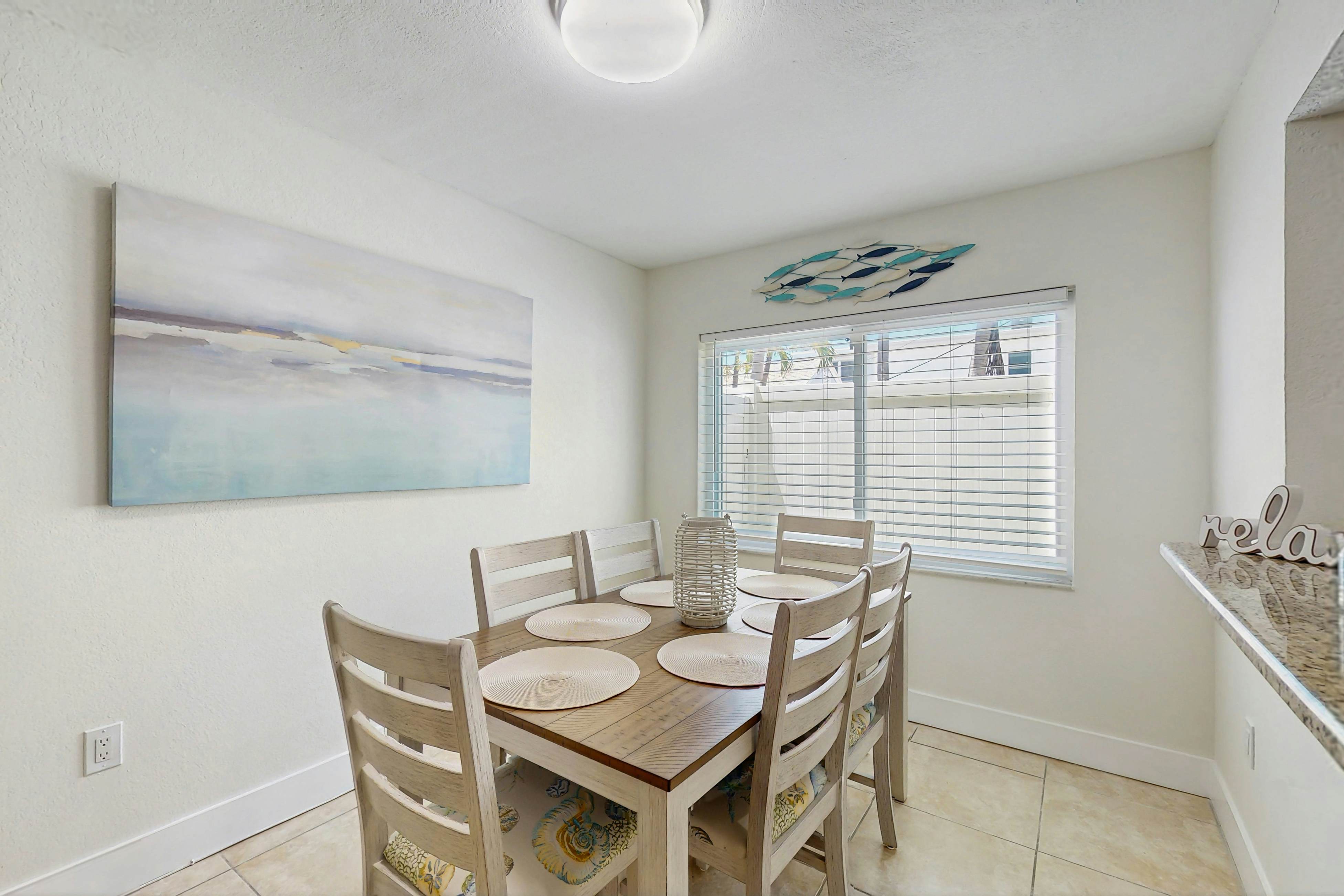 Ground-floor getaway with a heated pool & central AC - walk to the beach