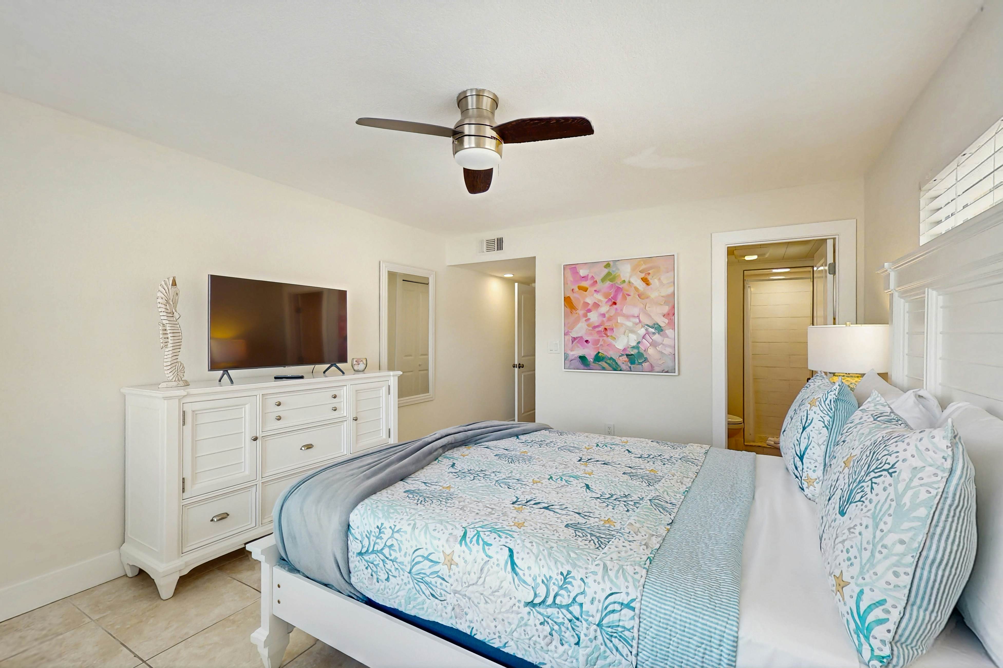 Ground-floor getaway with a heated pool & central AC - walk to the beach