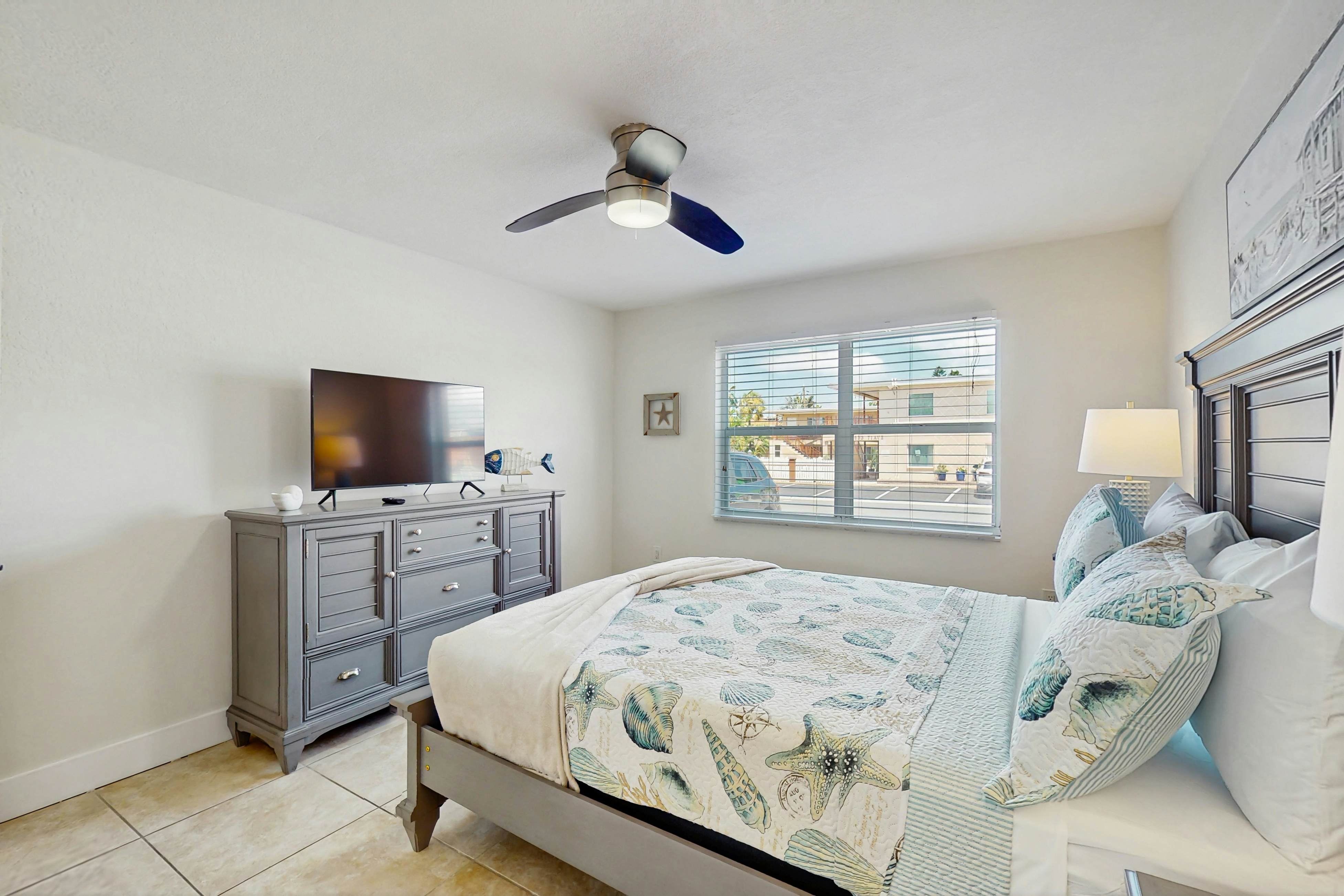 Ground-floor getaway with a heated pool & central AC - walk to the beach