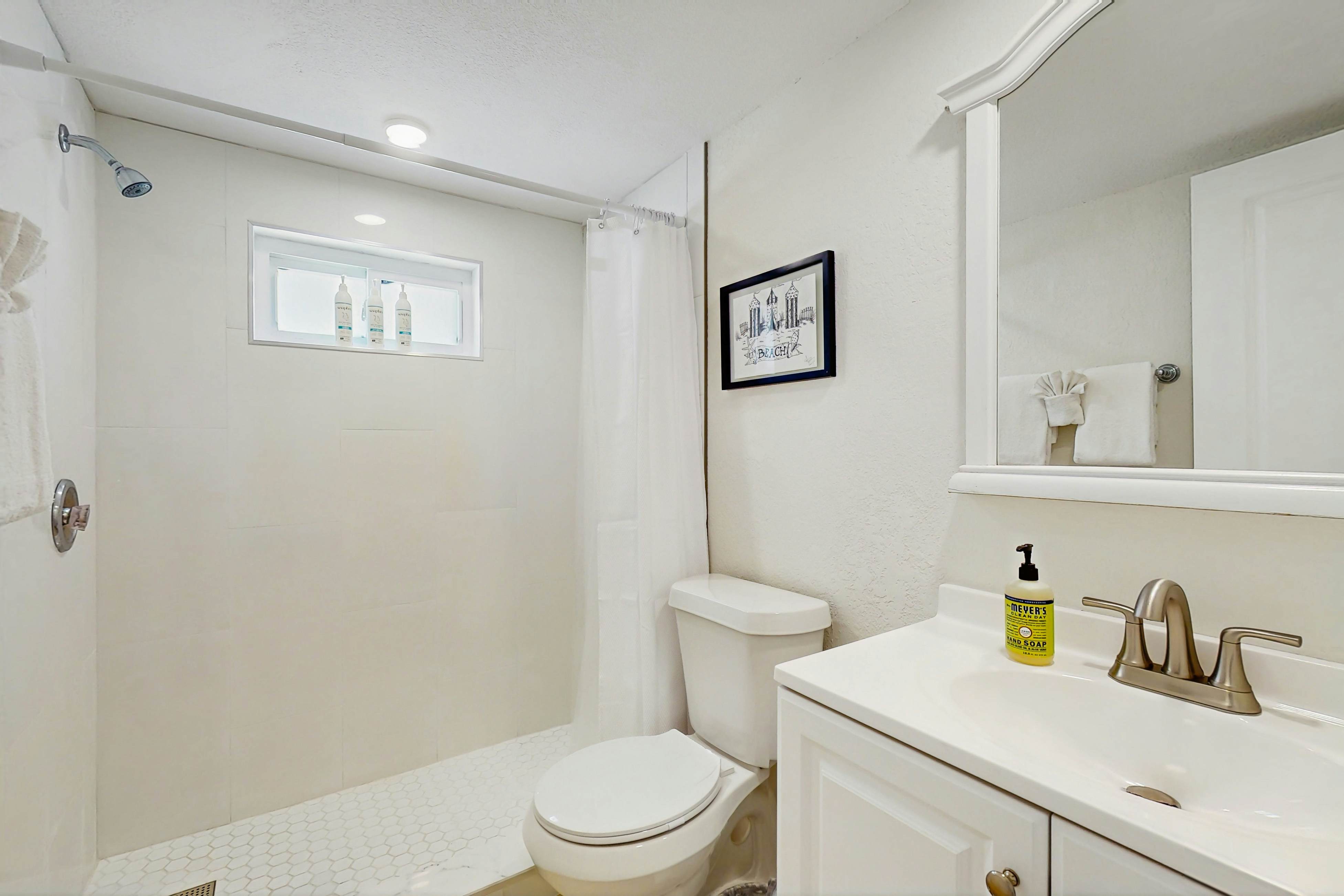 Ground-floor getaway with a heated pool & central AC - walk to the beach